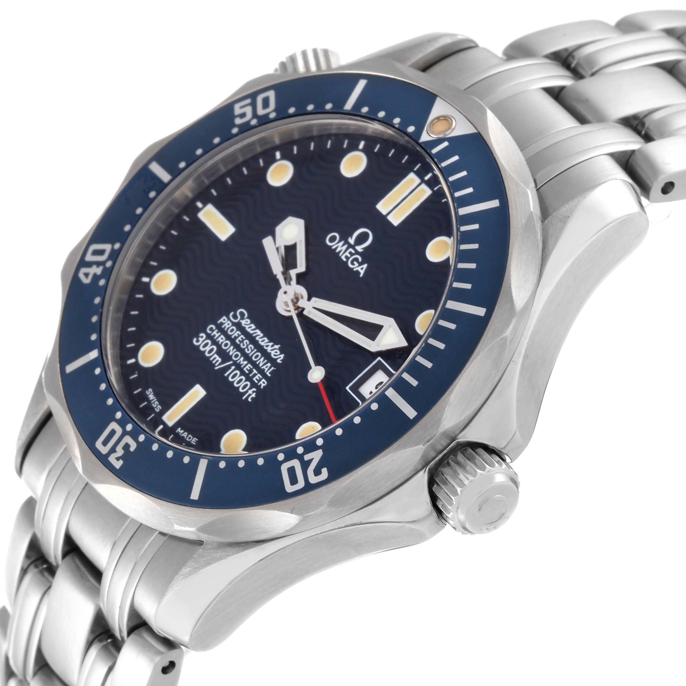 This is a side angle view of the Omega Seamaster 2551.80.00 Men's Stainless Steel Blue Dial 2551.80.00 Men's Stainless Steel Blue Dial showing the dial, bezel, crown, and part of the stainless steel bracelet.