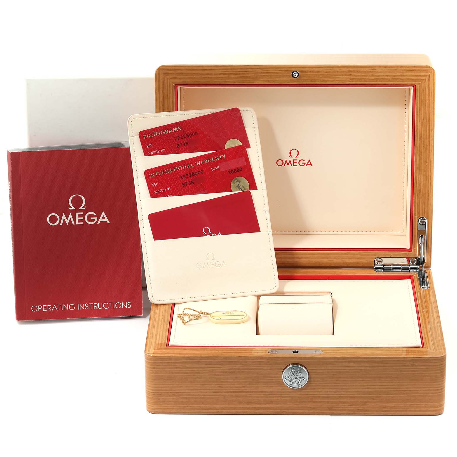 The image shows an Omega Seamaster 2222.80.00 Men
s Stainless Steel Blue Dial 2222.80.00 Men
s Stainless Steel Blue Dial watch box, operating instructions, warranty cards, and a keychain.
