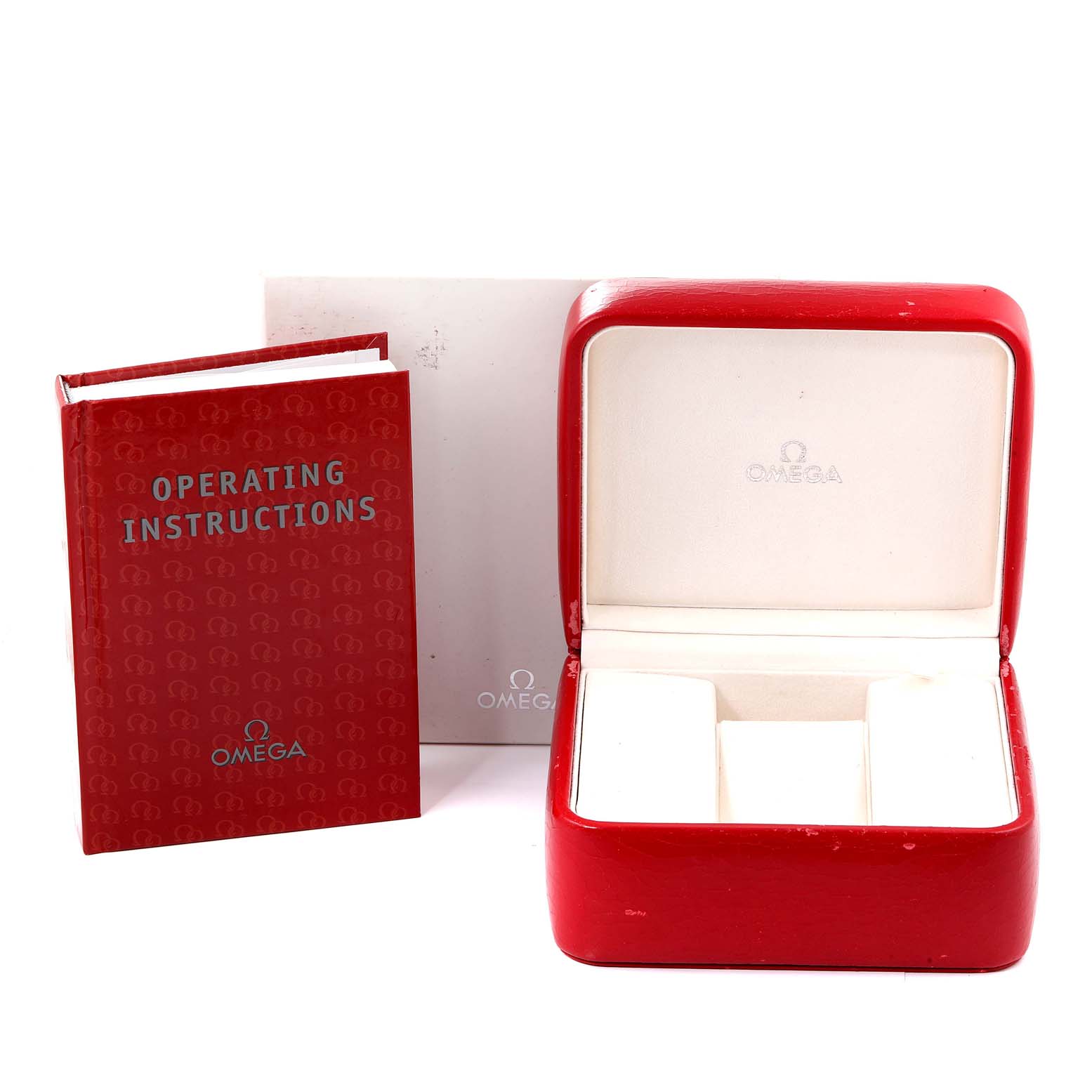 The image shows an Omega Planet Ocean 2208.50.00 Men
s Stainless Steel Black Dial 2208.50.00 Men
s Stainless Steel Black Dial watch box, operating instructions booklet, and a warranty card at a front angle.