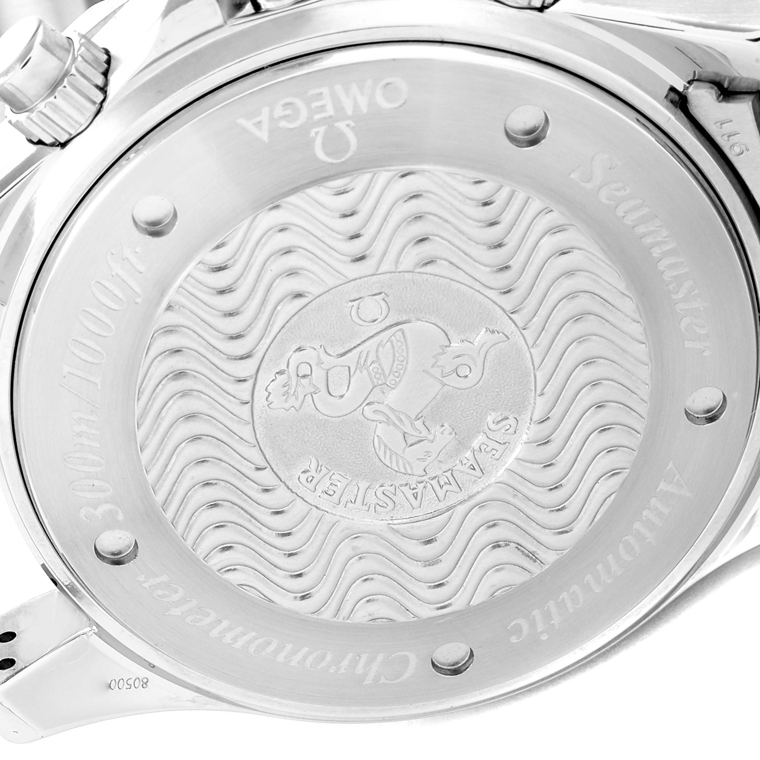 This image shows the engraved case back and crown of an Omega Seamaster 2569.50.00 Men's Stainless Steel Black Dial 2569.50.00 Men's Stainless Steel Black Dial watch, including its wave pattern and inscriptions.