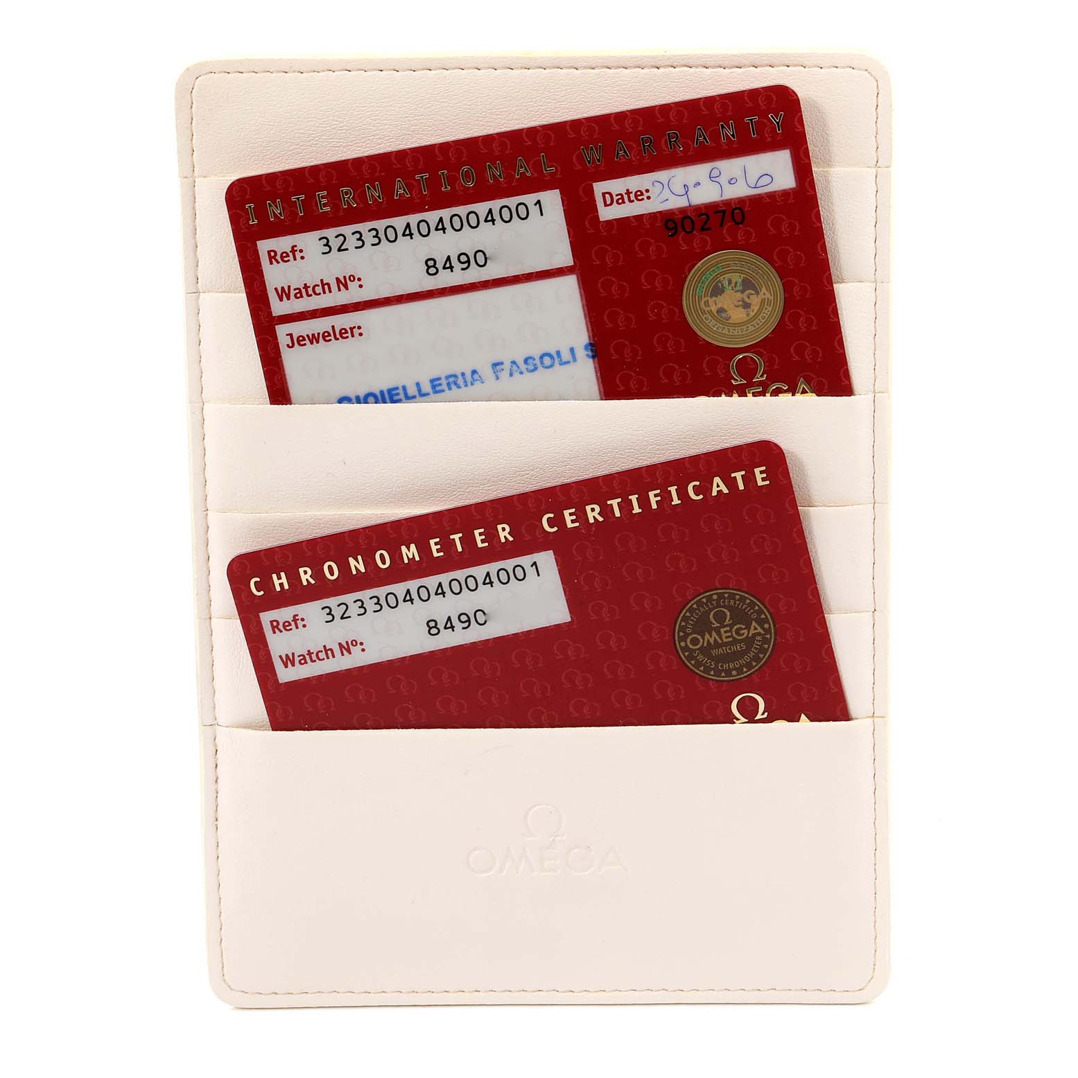 The image shows the international warranty and chronometer certificate cards for an Omega Speedmaster 323.30.40.40.04.001 Men's Stainless Steel White Dial 323.30.40.40.04.001 Men's Stainless Steel White Dial watch in a white cardholder.