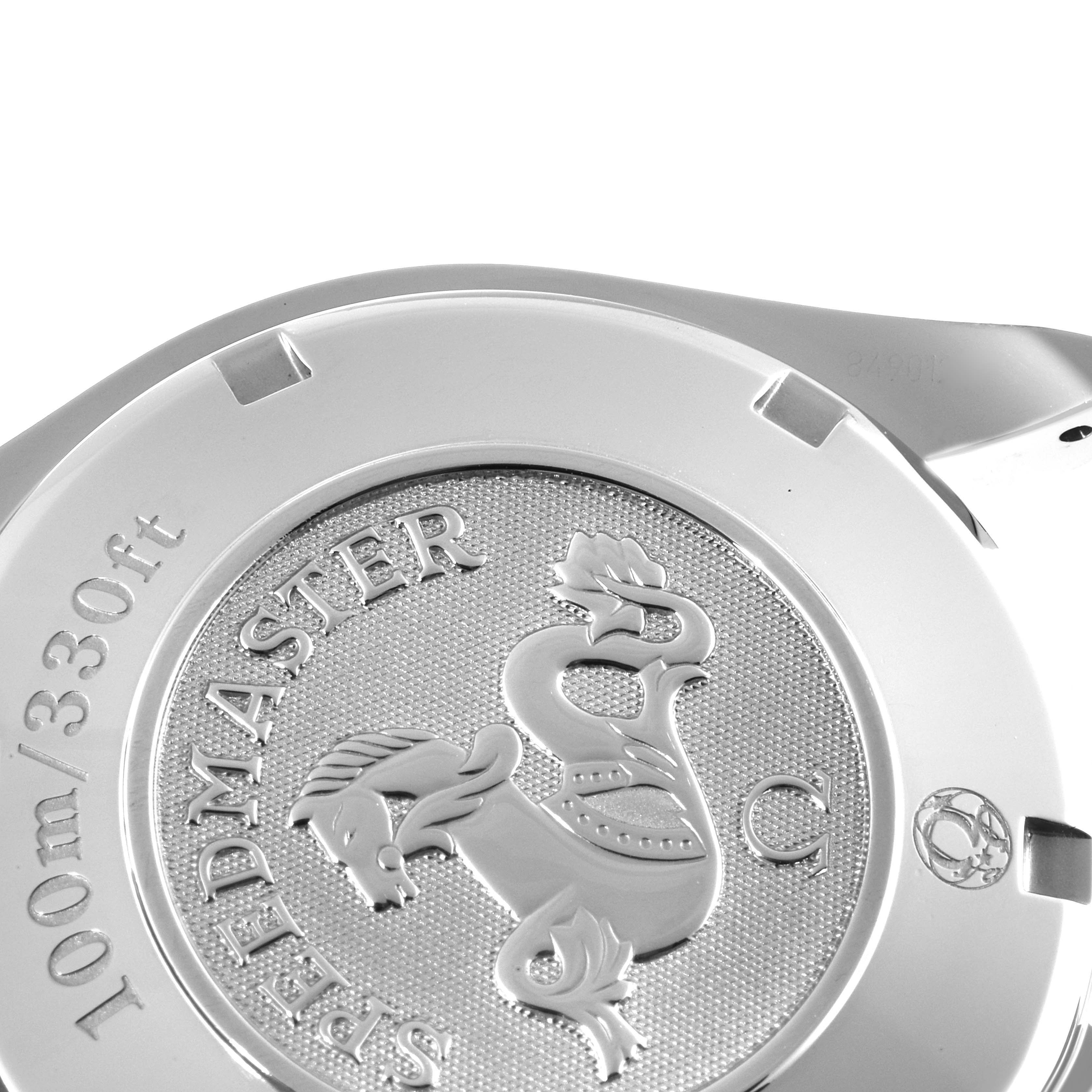 The image shows the engraved case back of an Omega Speedmaster 323.30.40.40.04.001 Men's Stainless Steel White Dial 323.30.40.40.04.001 Men's Stainless Steel White Dial watch with a detailed emblem and depth rating.