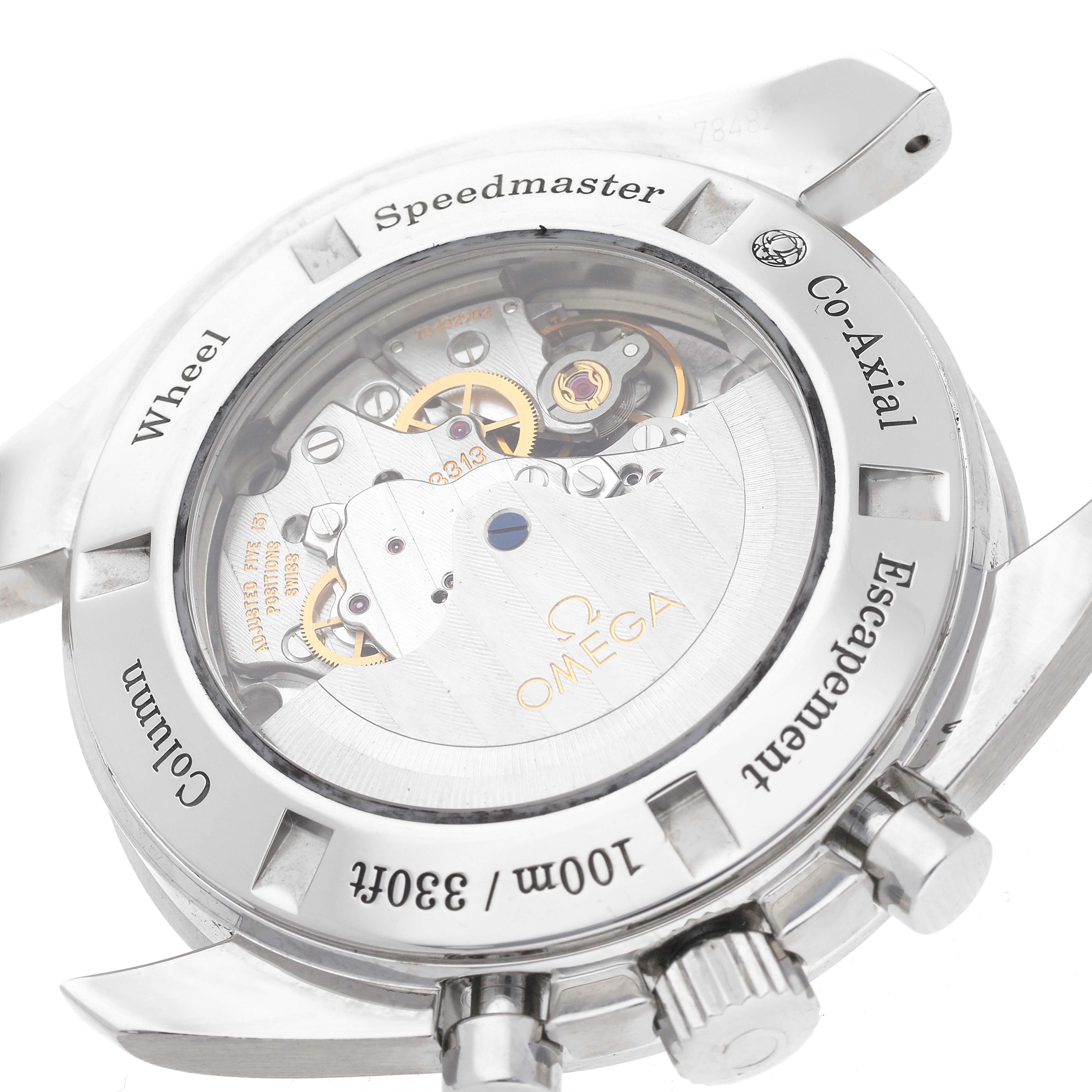 The image shows the back view of an Omega Speedmaster 311.30.44.50.01.002 Men
s Stainless Steel Black Dial 311.30.44.50.01.002 Men
s Stainless Steel Black Dial watch, displaying its inner mechanical components.