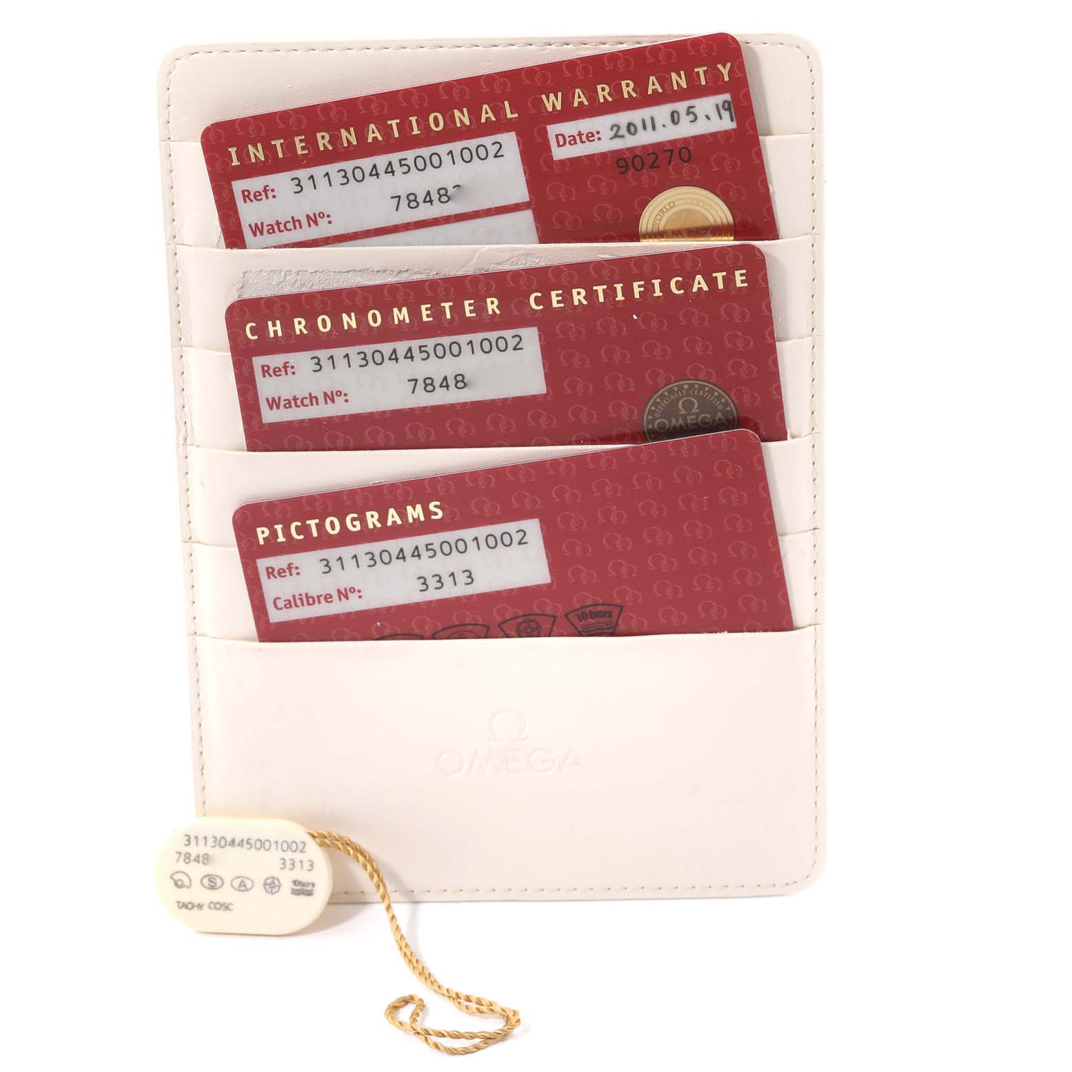 The image shows warranty cards and certification documents for the Omega Speedmaster 311.30.44.50.01.002 Men
s Stainless Steel Black Dial 311.30.44.50.01.002 Men
s Stainless Steel Black Dial watch.