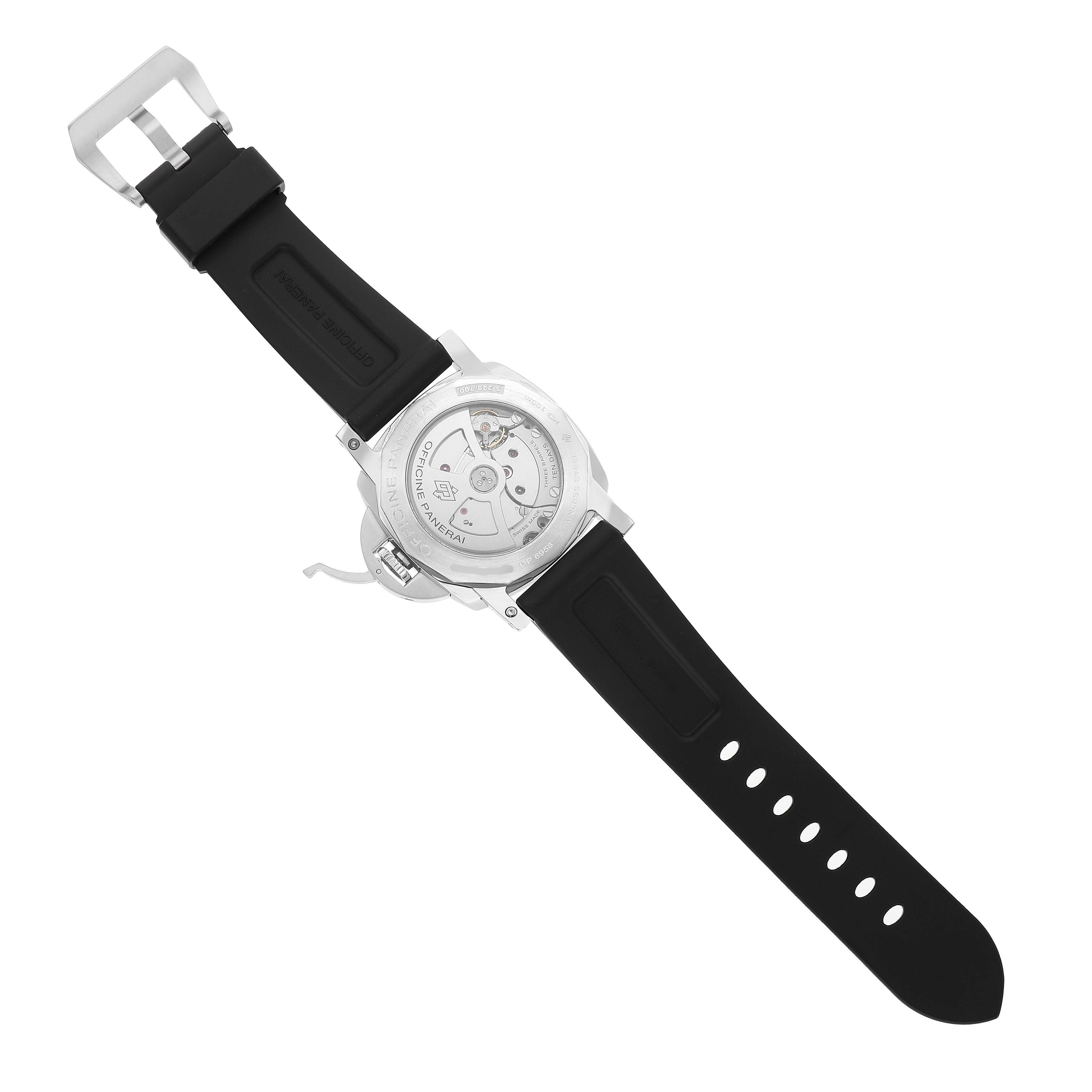 The image shows the back of a Panerai Luminor PAM00533 Men's Stainless Steel Black Dial watch with an exhibition case back and a black rubber strap.