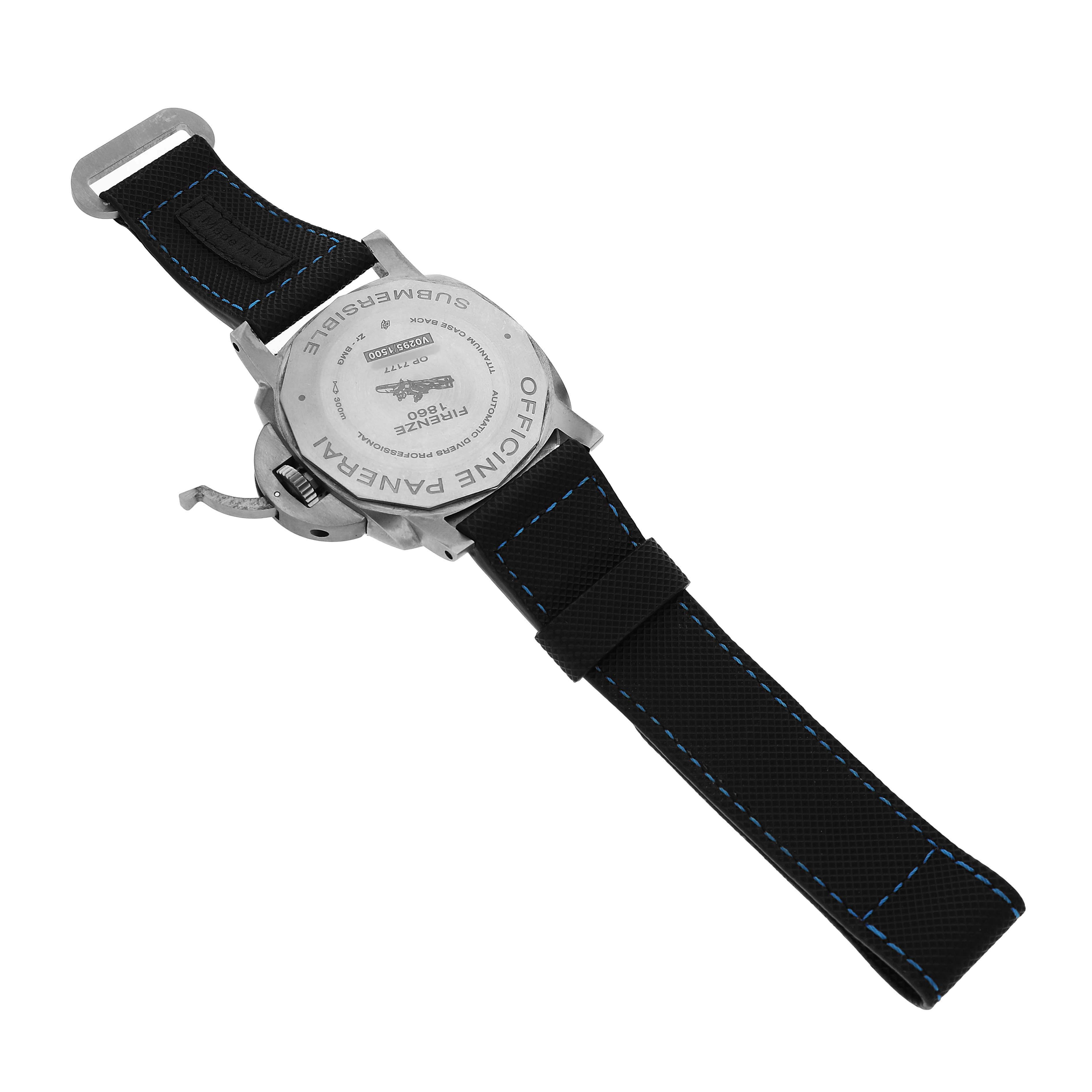 The image shows the back of the Panerai Submersible PAM00799 Men's Titanium Black Dial watch with a fabric strap and visible case back details.