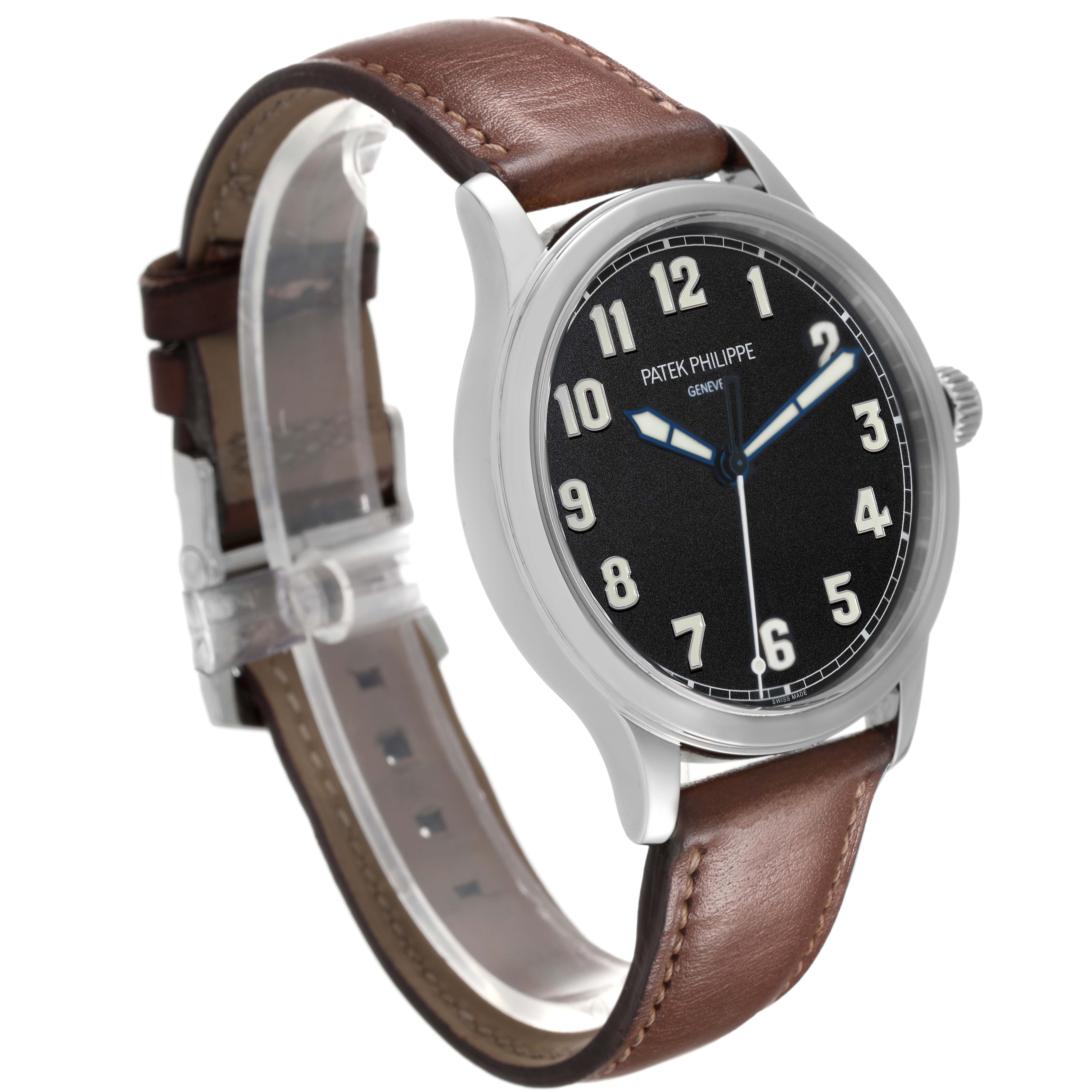 The Patek Philippe Calatrava 5522A-001 Men's Stainless Steel Blue Dial watch is shown at a slight side angle, highlighting the black dial, numerals, and brown leather strap.