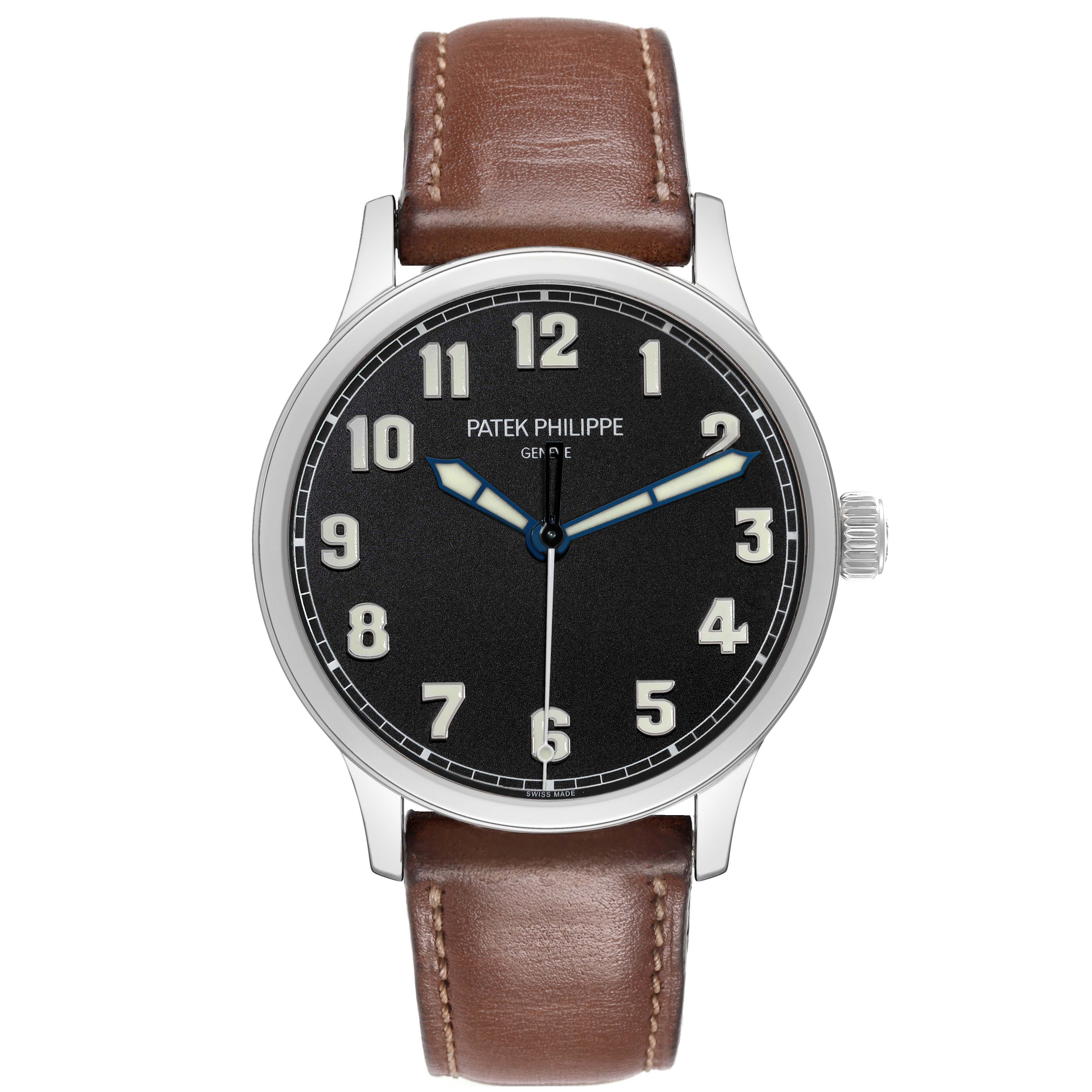 The Patek Philippe Calatrava 5522A-001 Men's Stainless Steel Blue Dial watch is shown from a front angle, displaying its face, case, crown, and brown leather strap.