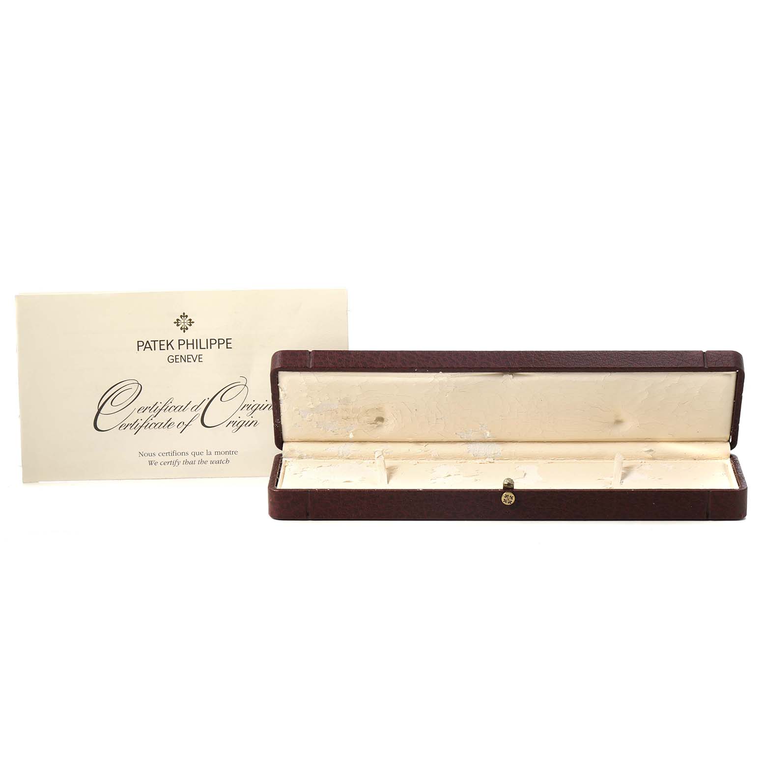 The image shows an empty Patek Philippe Calatrava 5026P-001 Men's Platinum Black Dial watch box and a Certificate of Origin from a front angle.