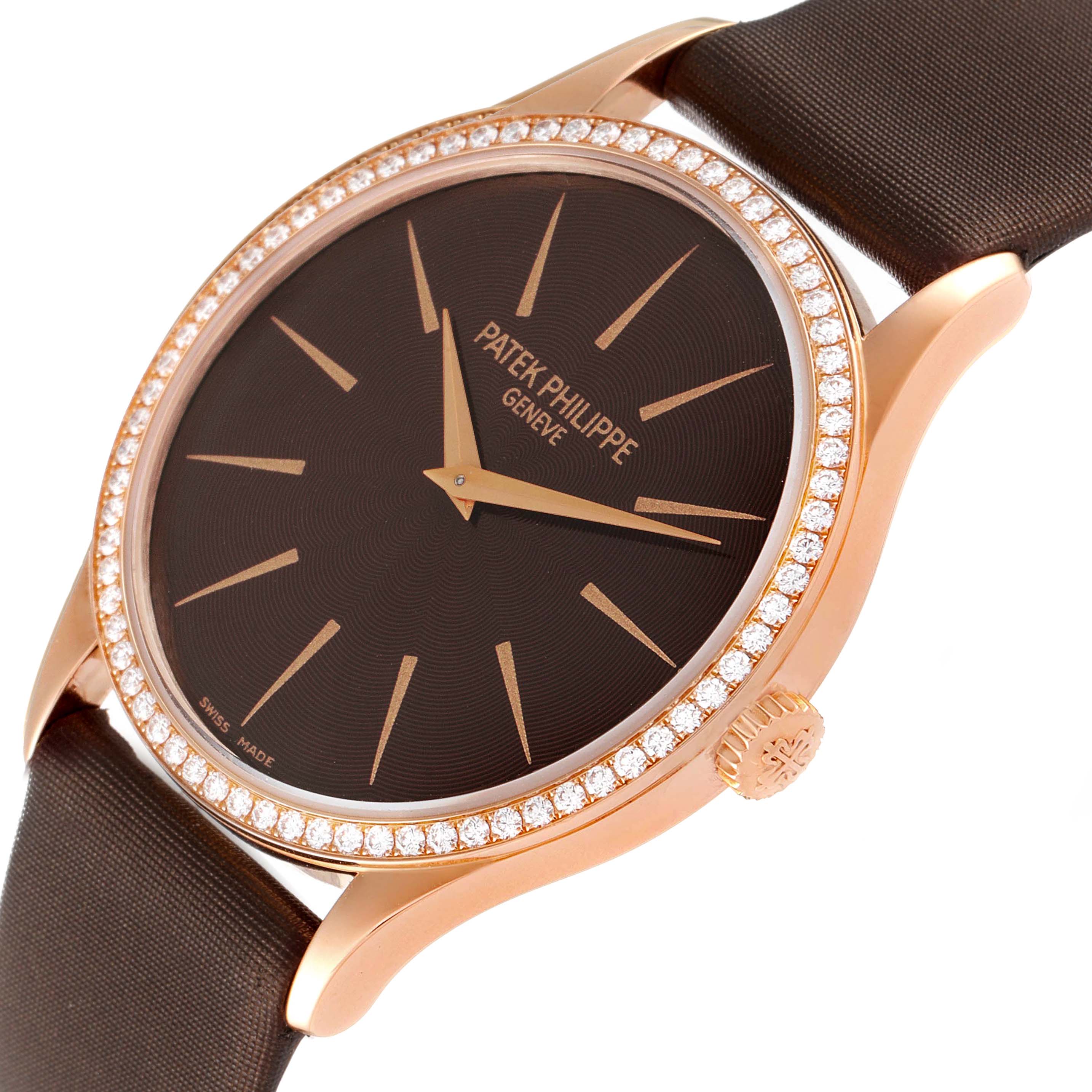 The image shows a close-up of the Patek Philippe Calatrava 4897R-001 Women
s Rose Gold Brown Dial 4897R-001 Women
s Rose Gold Brown Dial watch
s face, bezel, and crown from a slightly angled perspective.