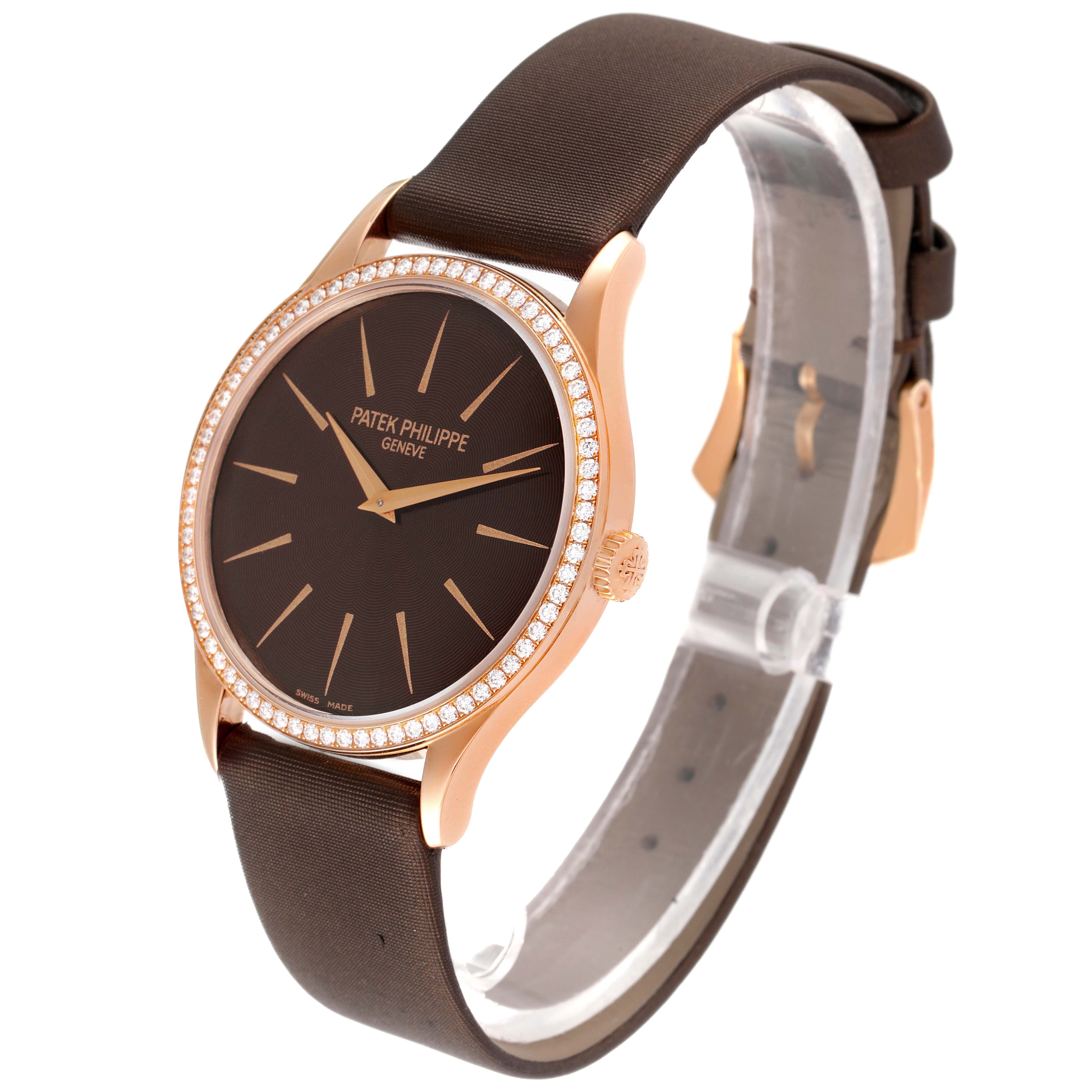The image shows a side view of the Patek Philippe Calatrava 4897R-001 Women
s Rose Gold Brown Dial 4897R-001 Women
s Rose Gold Brown Dial watch, highlighting its dial, bezel, and strap.