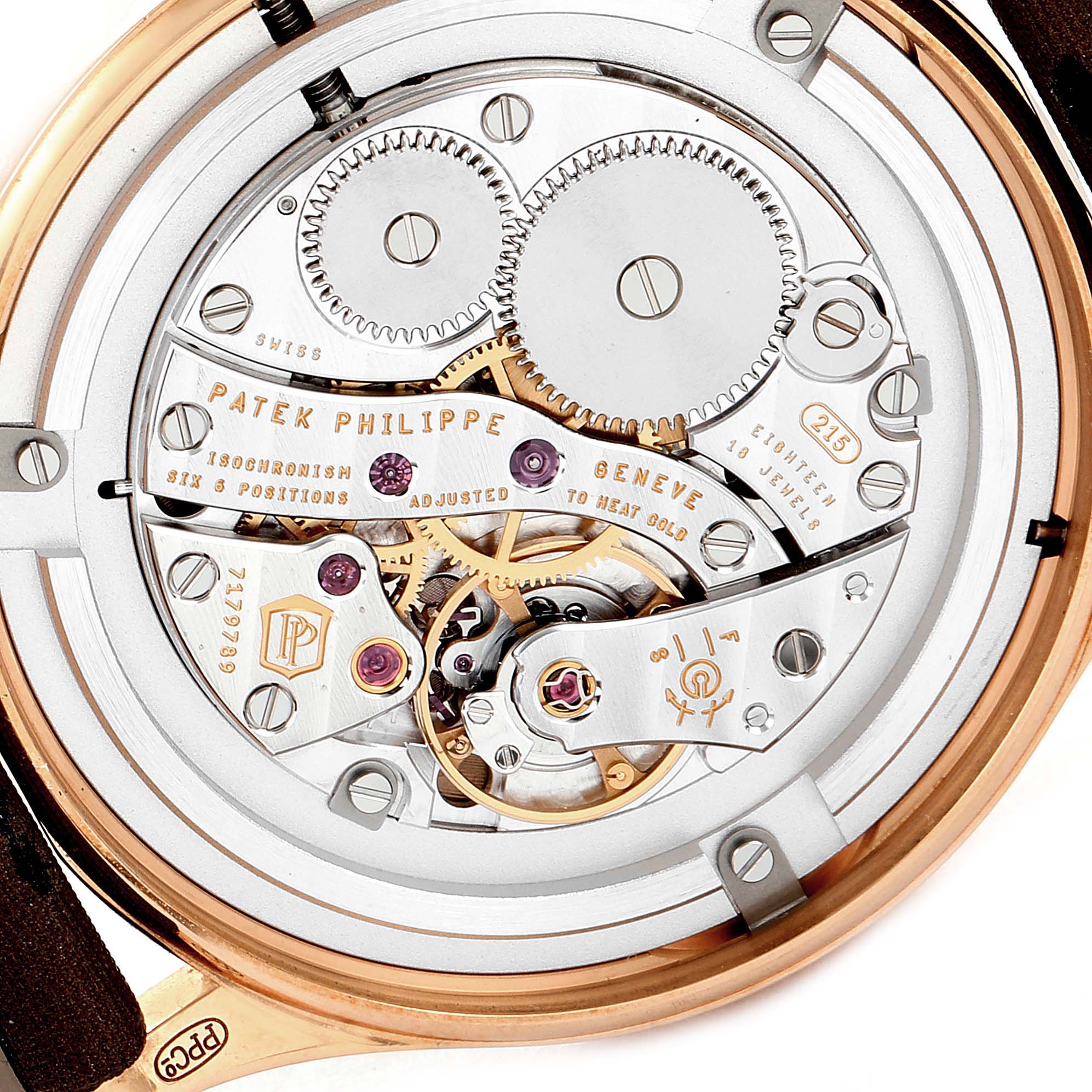 This image shows the back view of the Patek Philippe Calatrava 4897R-001 Women
s Rose Gold Brown Dial 4897R-001 Women
s Rose Gold Brown Dial watch, highlighting its intricate movement and components.