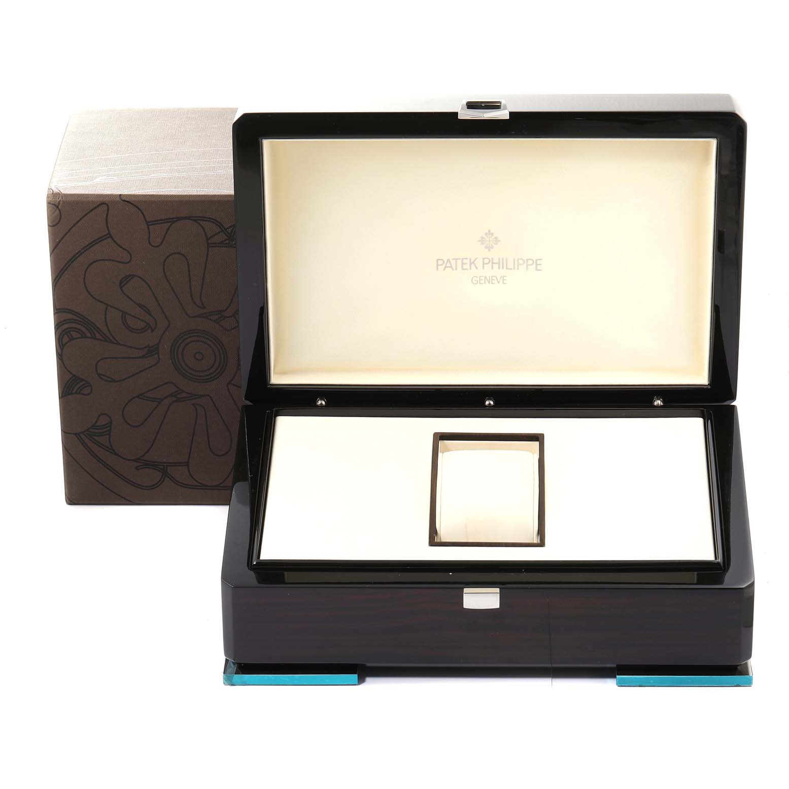 The image shows a Patek Philippe Calatrava 5296G Men's White Gold Silver Dial 5296G Men's White Gold Silver Dial watch box with the lid open, showcasing the luxurious interior and space for the watch.