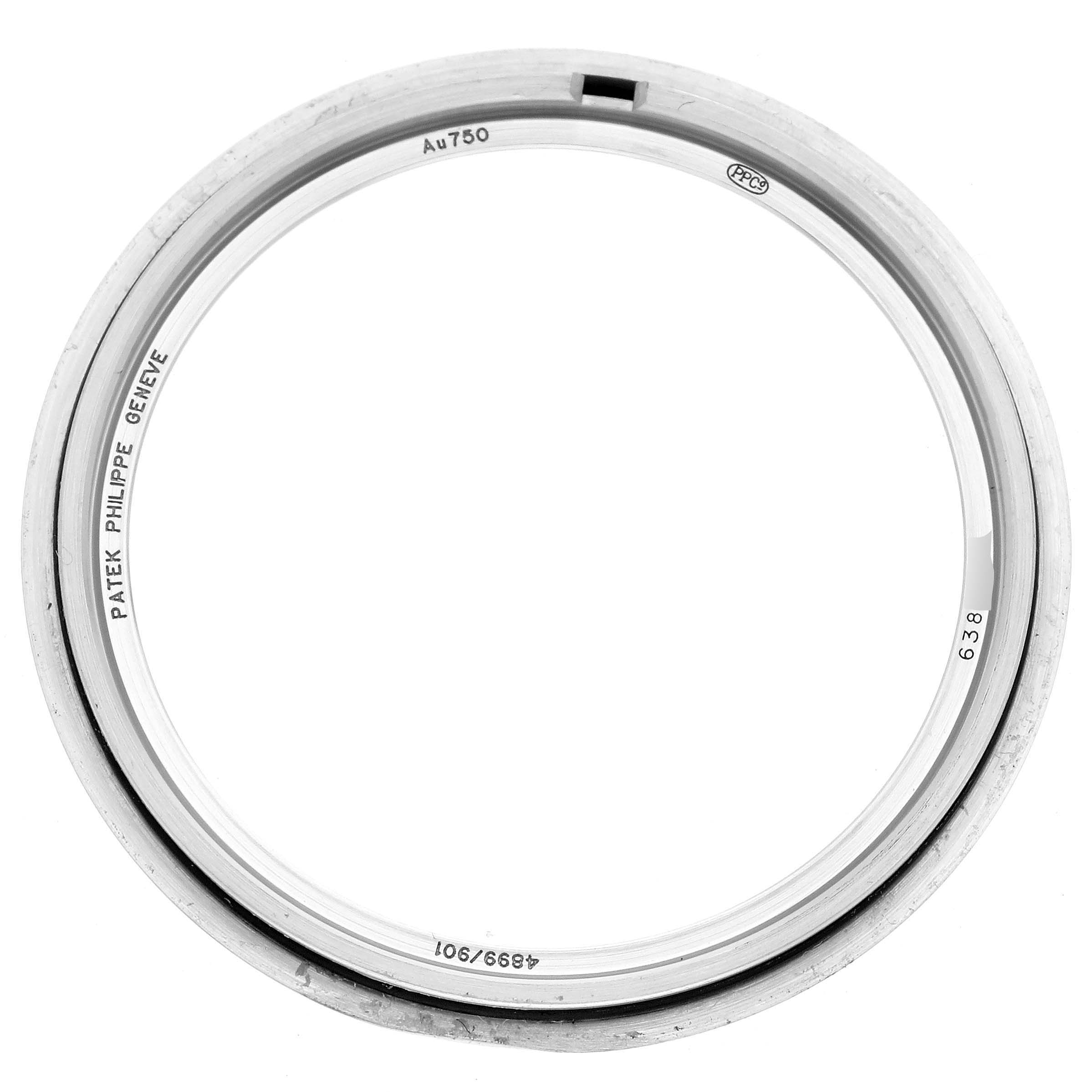 This image shows a close-up view of a bezel for the Patek Philippe Calatrava 4899/901G Women's White Gold Mother of Pearl Dial 4899/901G Women's White Gold Mother of Pearl Dial watch model.