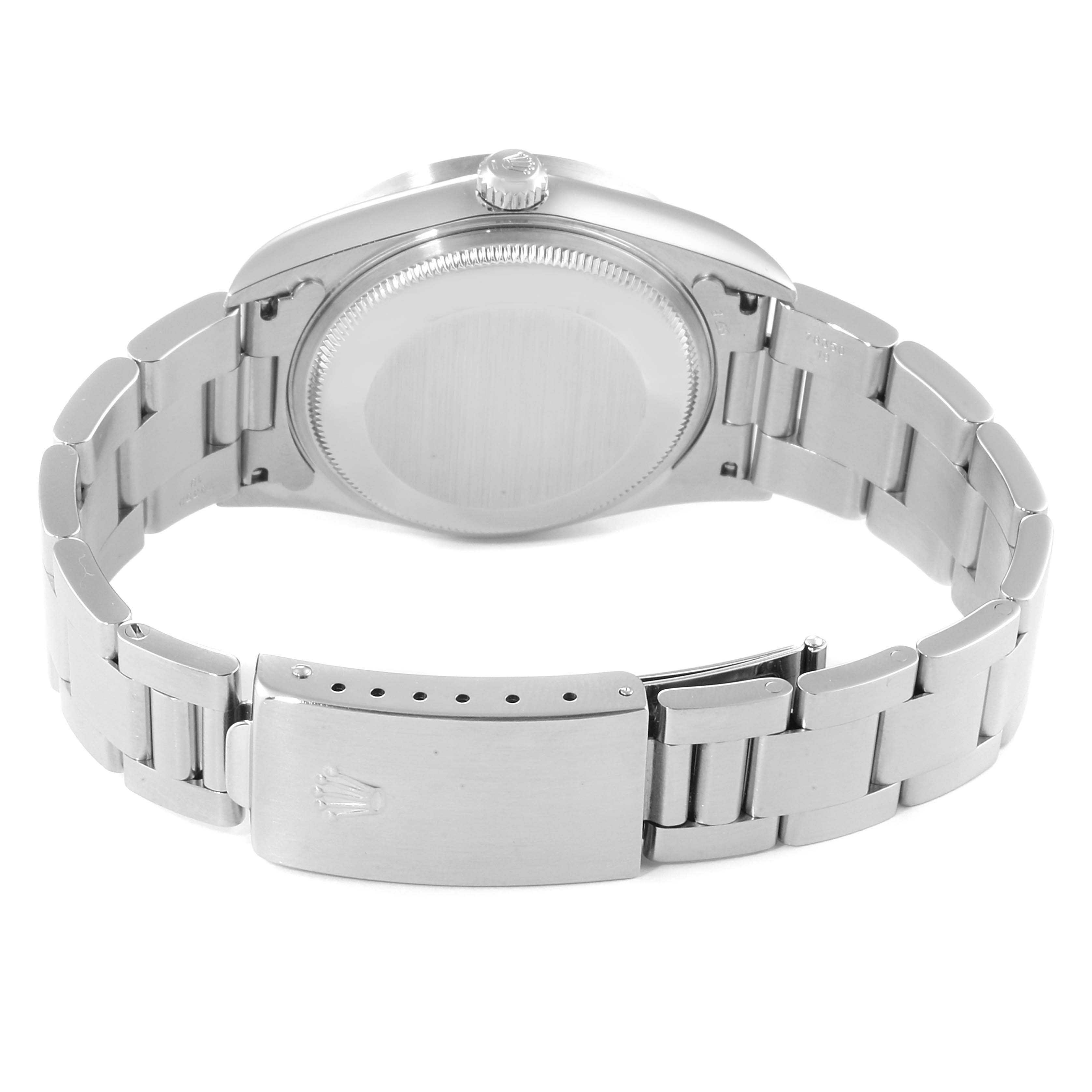 This image shows the back case and clasp of a Rolex Air-King 14010 Men's Stainless Steel Blue Dial 14010 Men's Stainless Steel Blue Dial watch from a rear and slightly elevated angle.