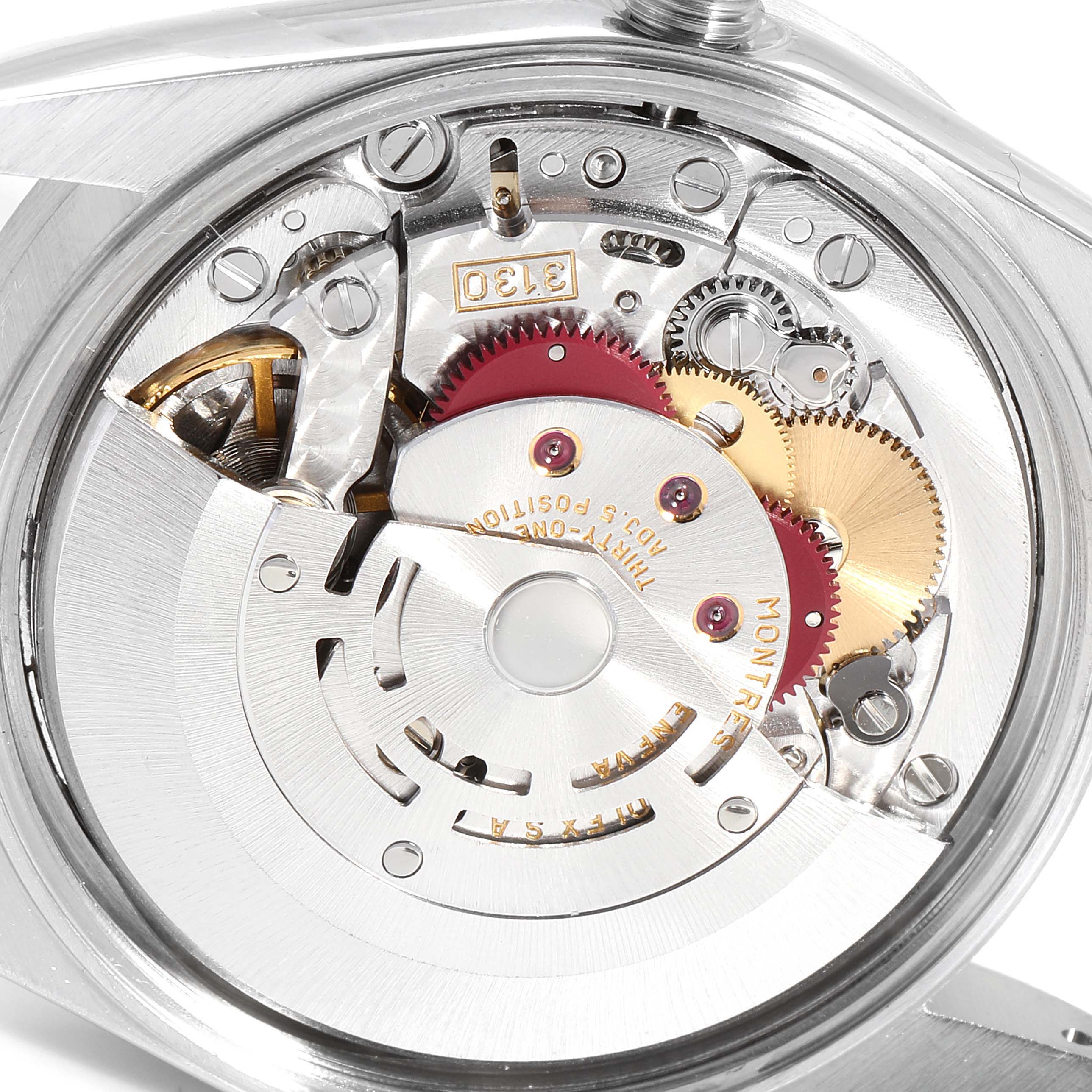 The image shows the internal mechanism of a Rolex Air-King 14010 Men's Stainless Steel Blue Dial 14010 Men's Stainless Steel Blue Dial watch, focusing on the movement and gears.