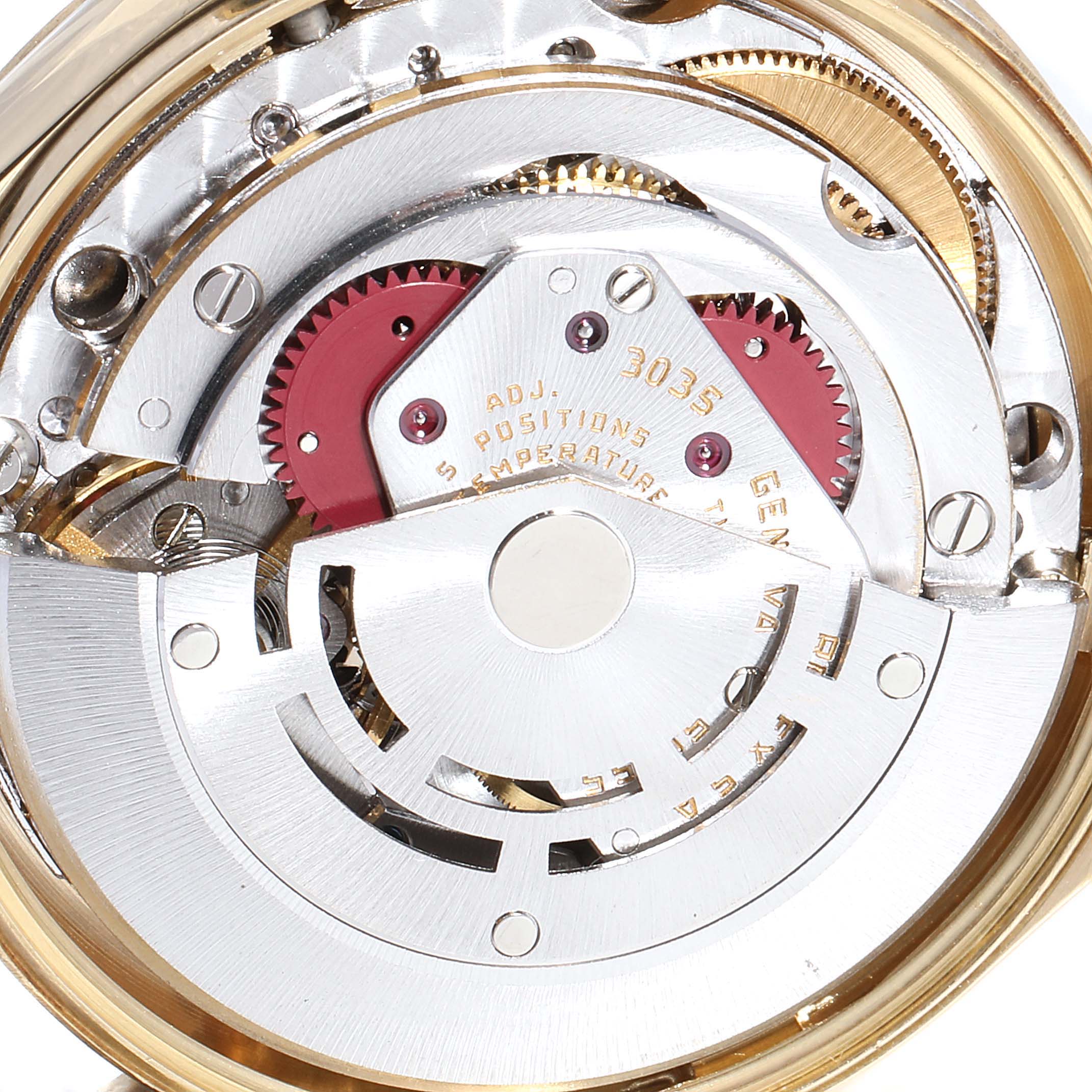 This is a close-up of the movement mechanism of a Vintage Collection model by Rolex, showing gears and components.