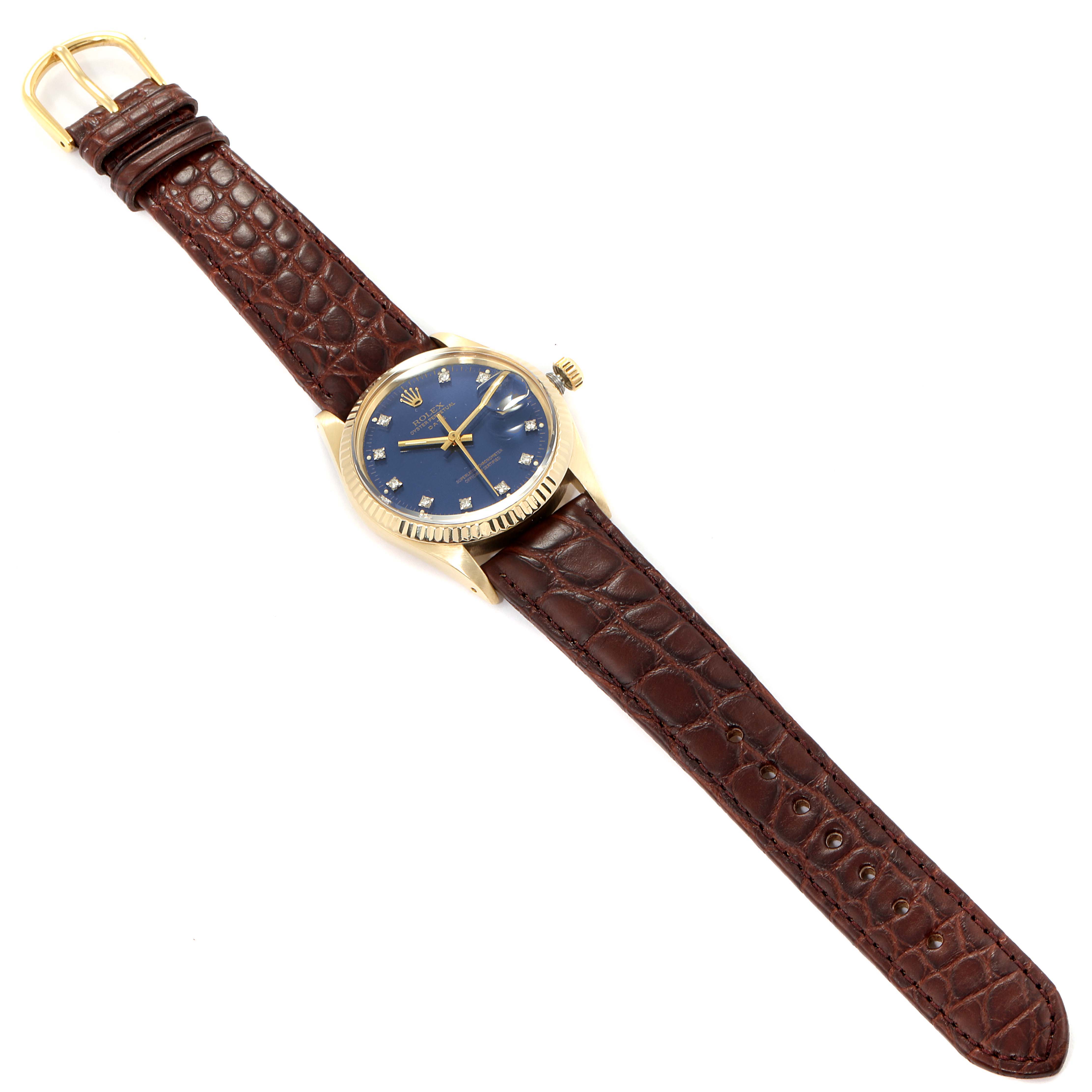This image shows a top view of the Vintage Collection Rolex watch, featuring its brown leather strap and blue dial.