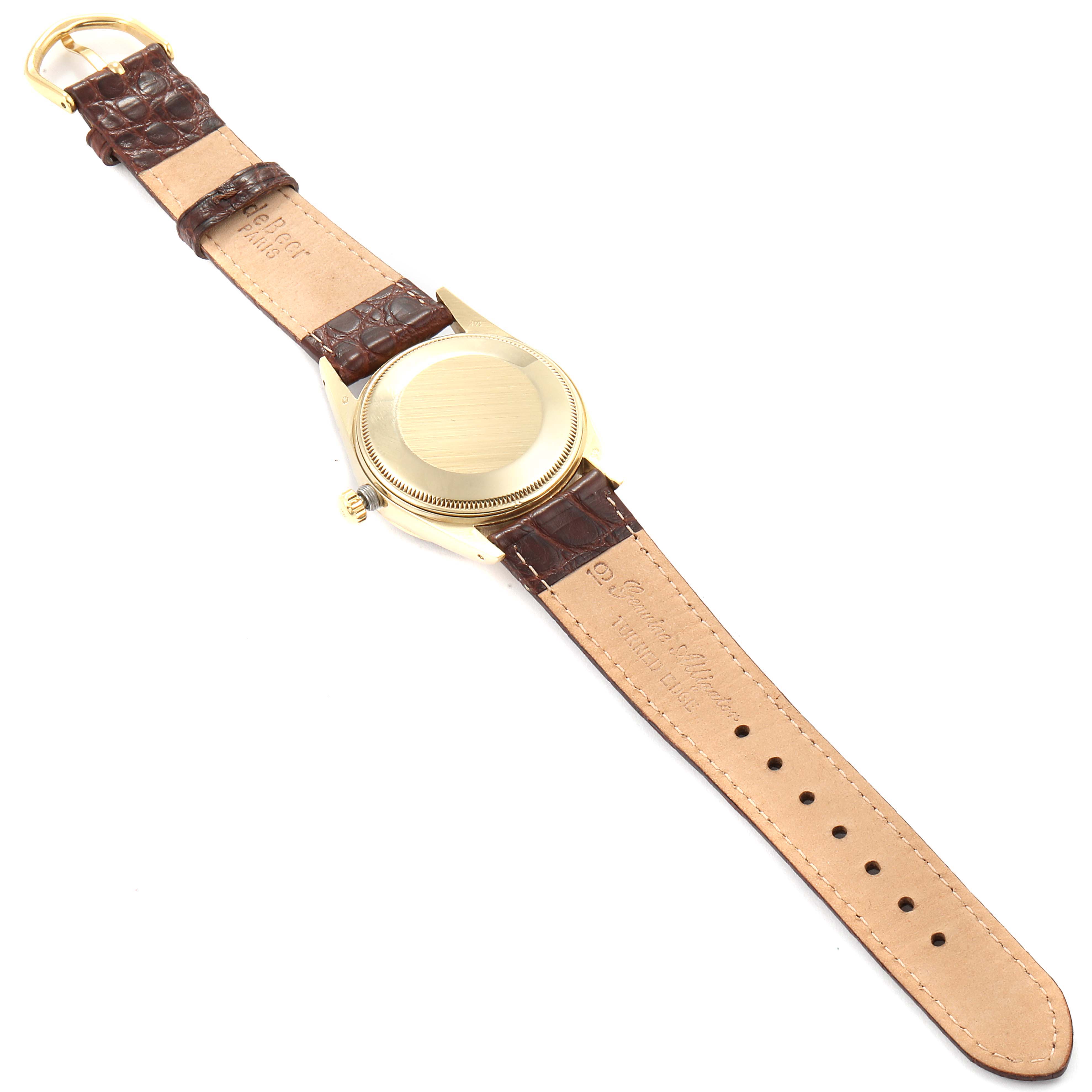 The image shows the back case and leather strap of the Rolex Vintage Collection 15037 Men
s Yellow Gold Blue Dial 15037 Men
s Yellow Gold Blue Dial model, viewed from the back.