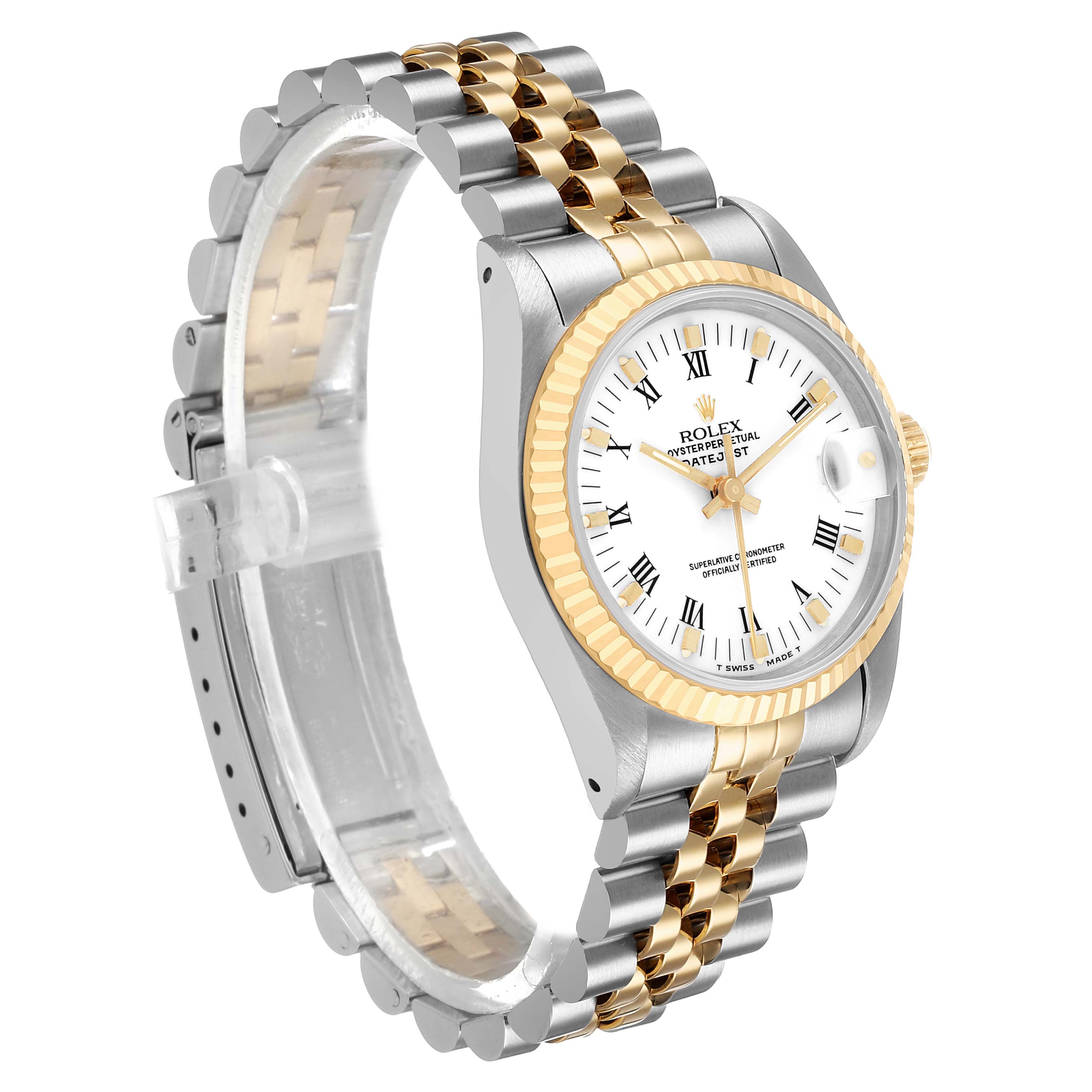 The Rolex Mid-Size 68273 Women's Steel and Gold (two tone) White Dial watch is shown at a three-quarter angle, highlighting the face, bezel, and bracelet.