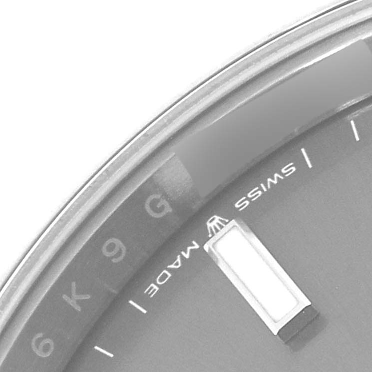 The image shows a close-up of the dial and bezel of a Rolex Datejust 41 126300 Men
s Stainless Steel Grey Dial 126300 Men
s Stainless Steel Grey Dial watch, focusing on the "Swiss Made" text.