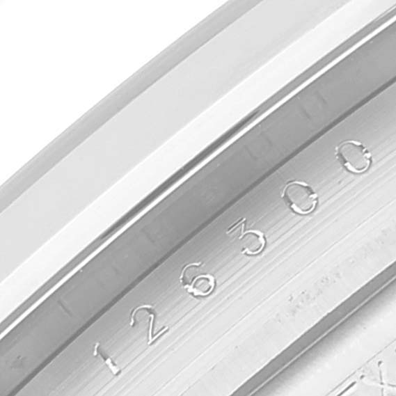 This close-up image of a Rolex Datejust 41 126300 Men
s Stainless Steel Grey Dial 126300 Men
s Stainless Steel Grey Dial watch shows part of the inner bezel with engraved numeric markings.