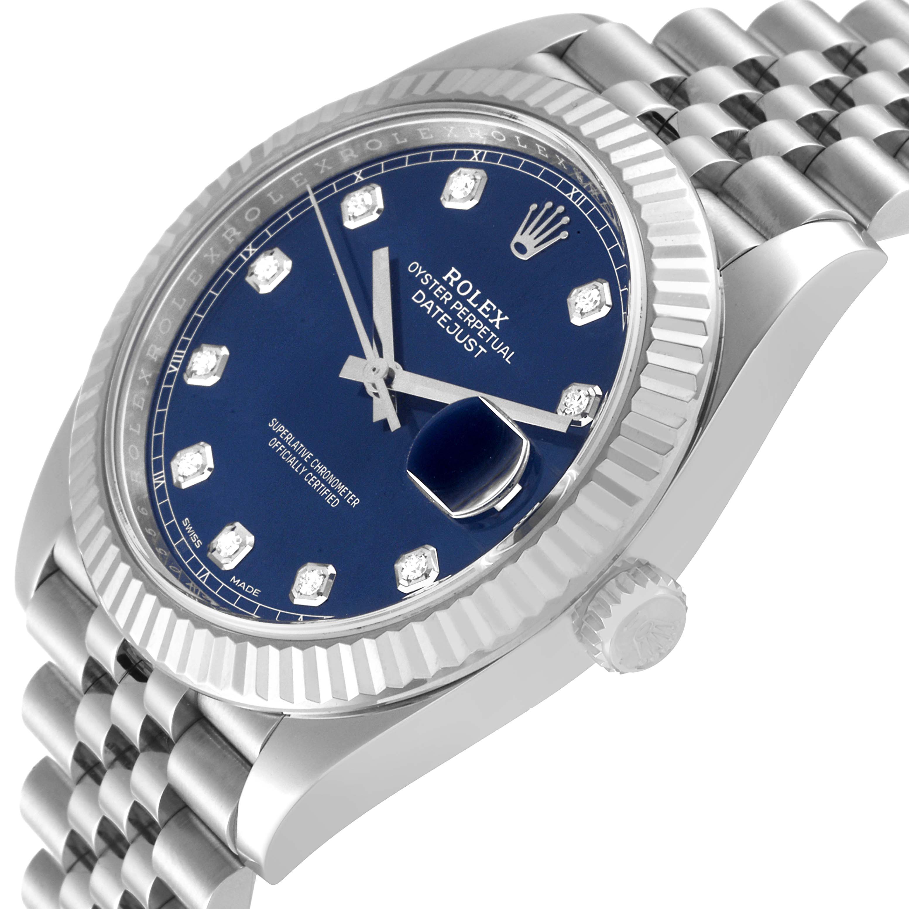 The image shows a side angle of a Rolex Datejust 41 126334 Men
s Stainless Steel Blue Dial 126334 Men
s Stainless Steel Blue Dial watch, highlighting the dial, bezel, crown, and part of the bracelet.