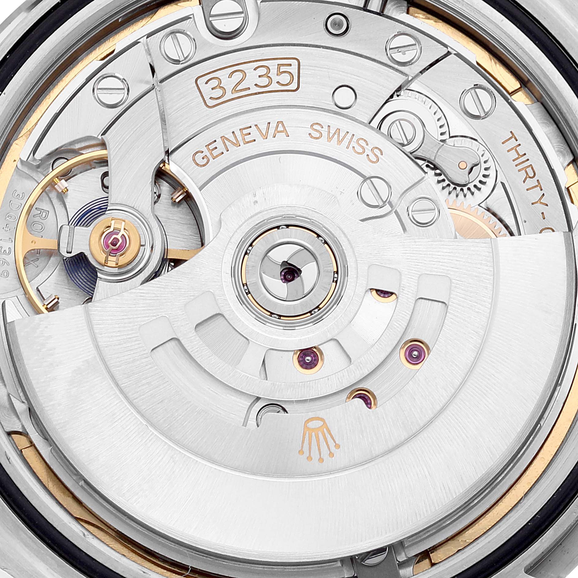 This image shows a close-up view of the inner movement mechanism of the Rolex Datejust 41 126334 Men
s Stainless Steel Blue Dial 126334 Men
s Stainless Steel Blue Dial, highlighting the 3235 caliber.