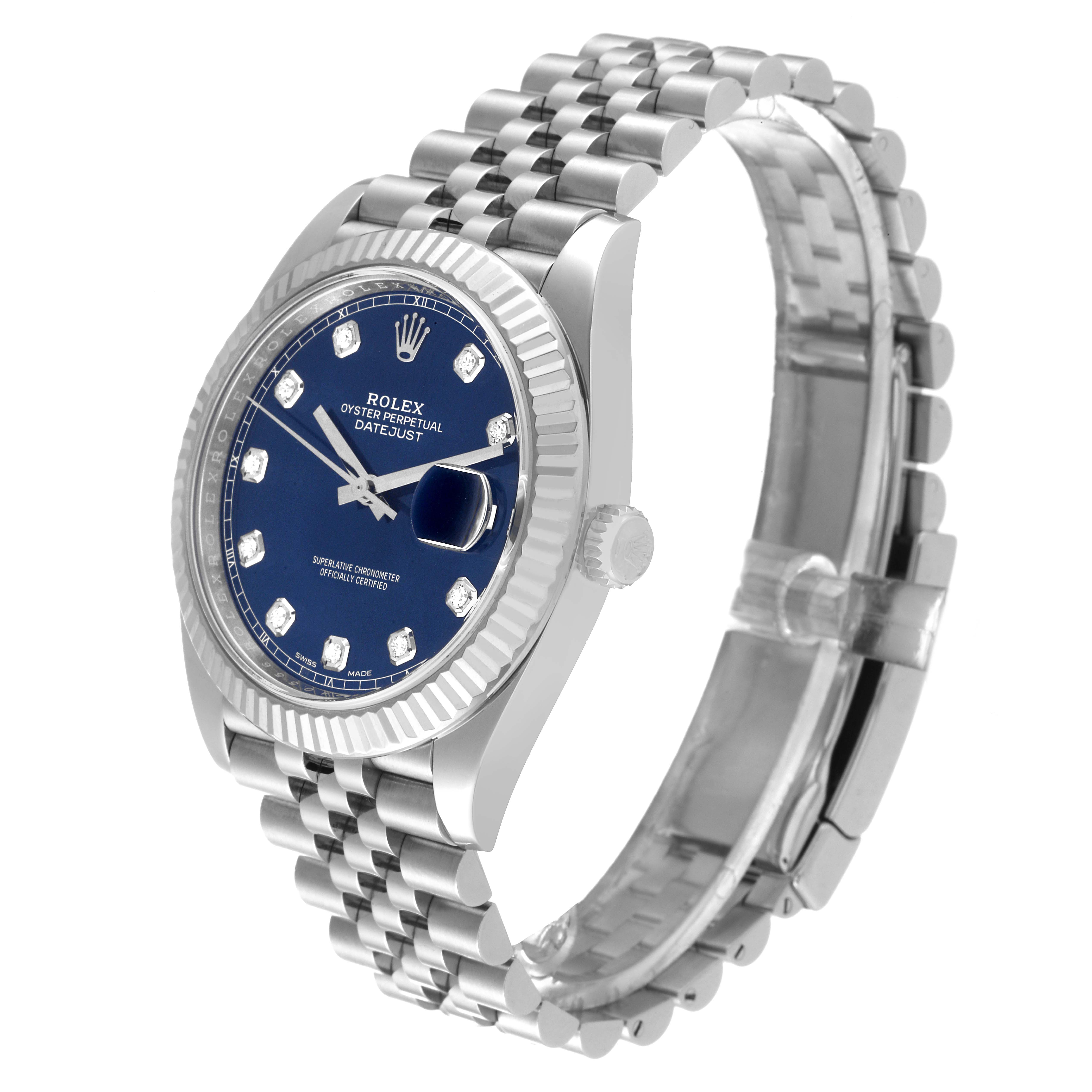 The image shows a Rolex Datejust 41 126334 Men
s Stainless Steel Blue Dial 126334 Men
s Stainless Steel Blue Dial watch at an angle highlighting the bracelet, crown, bezel, and blue dial with diamond hour markers.
