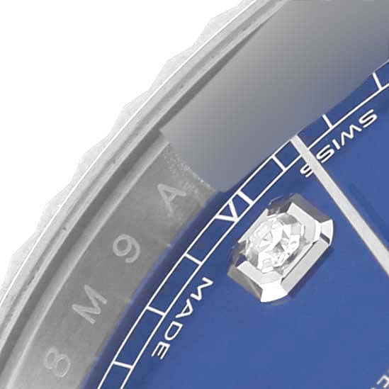 This image shows a close-up of the dial, bezel, and one hour marker of the Rolex Datejust 41 126334 Men
s Stainless Steel Blue Dial 126334 Men
s Stainless Steel Blue Dial watch.