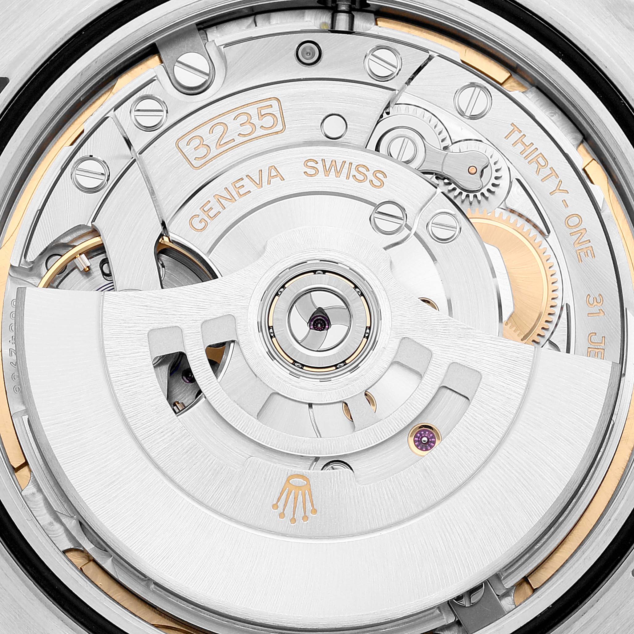 The image shows the intricate inner mechanism of the Rolex Datejust 41 126334 Men's Stainless Steel Mother of Pearl Dial 126334 Men's Stainless Steel Mother of Pearl Dial watch, highlighting the oscillating weight and movement components.