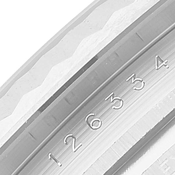 The image shows a close-up view of the Rolex Datejust 41 126334 Men's Stainless Steel Mother of Pearl Dial 126334 Men's Stainless Steel Mother of Pearl Dial watch's inner bezel with engraved model numbers.