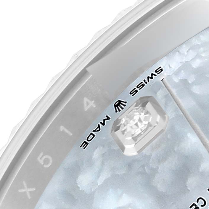 This image shows a close-up of the dial and part of the bezel of the Rolex Datejust 41 126334 Men's Stainless Steel Mother of Pearl Dial 126334 Men's Stainless Steel Mother of Pearl Dial watch, highlighting the "Swiss Made" marking and part of the indices.