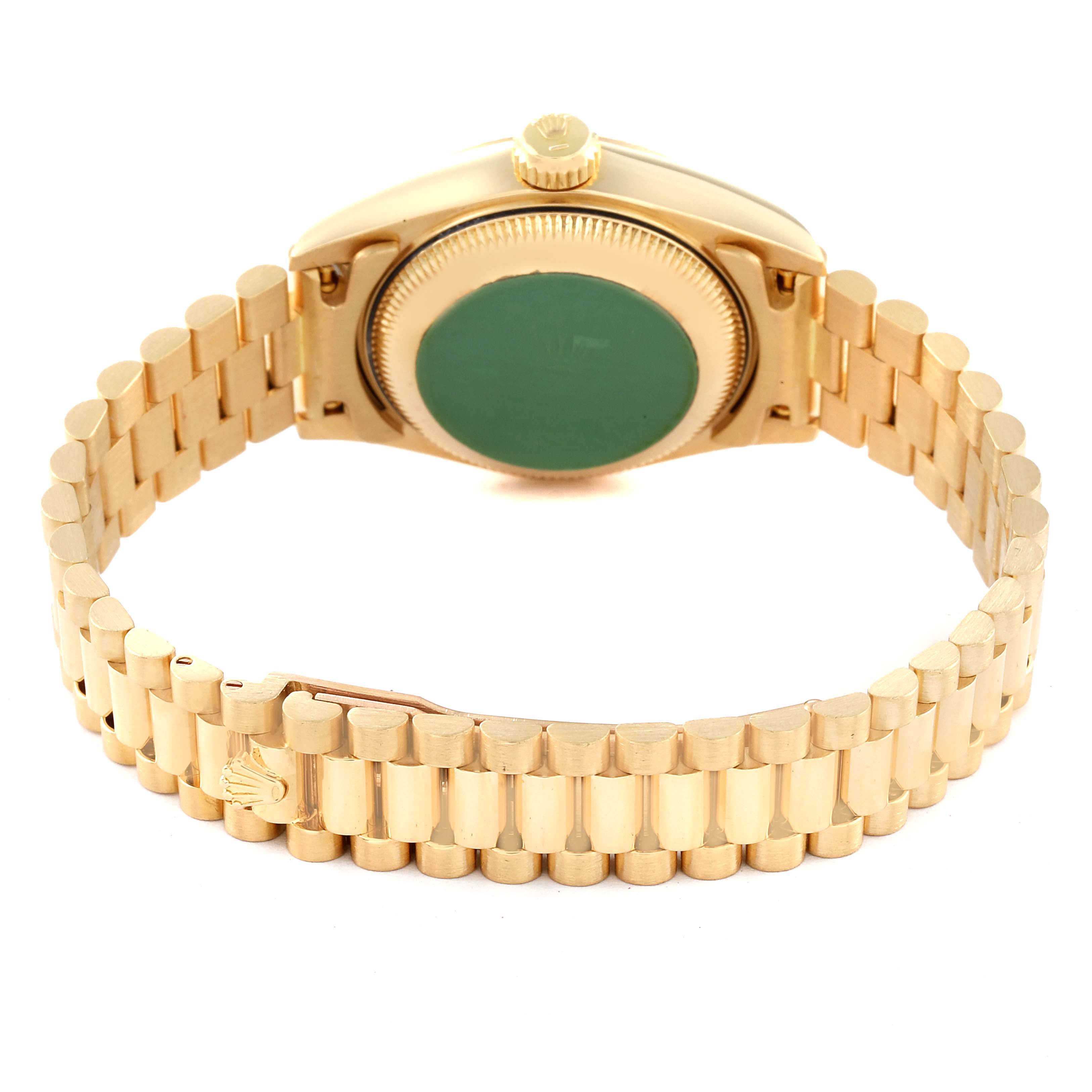 The image shows the back view of a Rolex President 69178 Women
s Yellow Gold Champagne Dial 69178 Women
s Yellow Gold Champagne Dial model watch, highlighting the bracelet and the case back.
