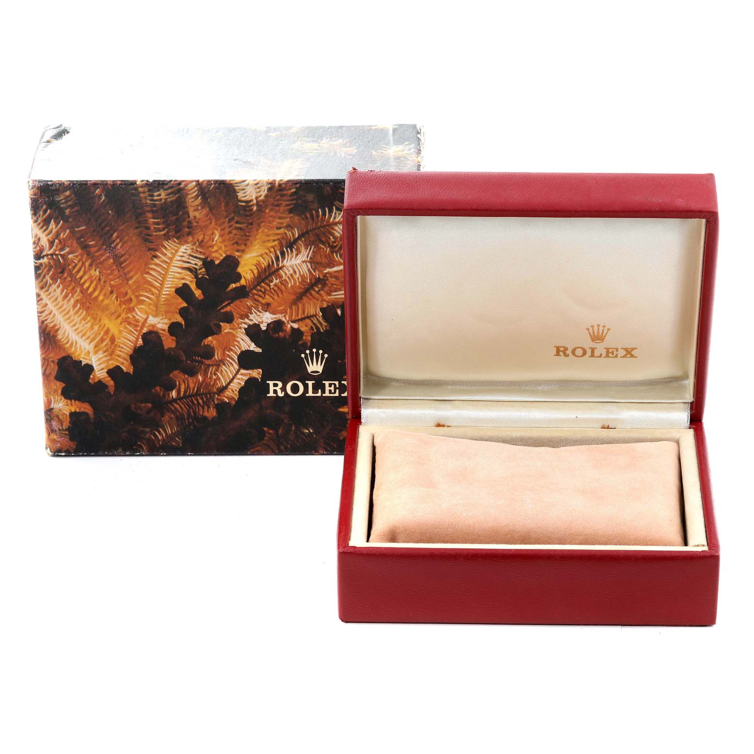 The image shows an open Rolex watch box and its outer packaging, designed for the President model.