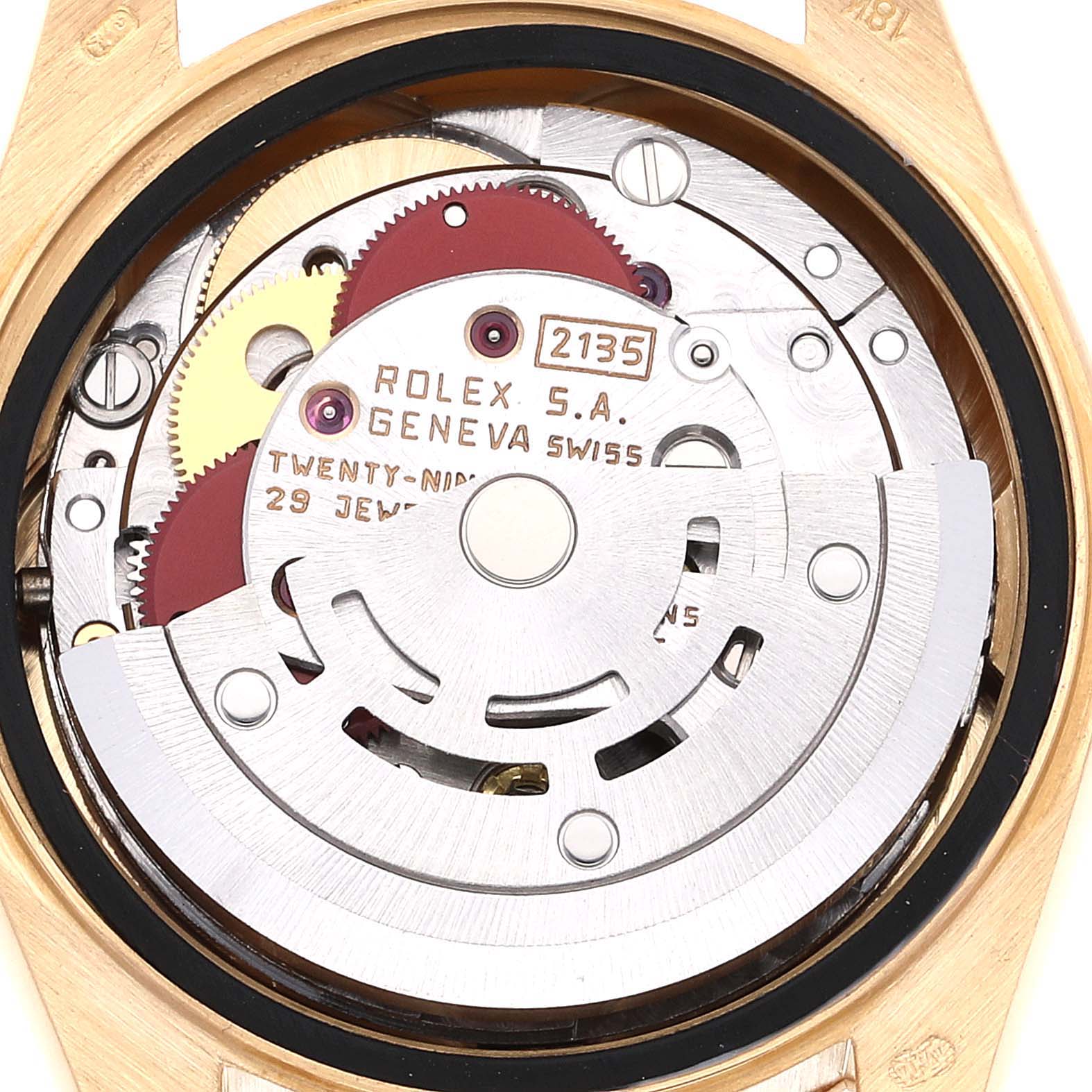 This image shows the internal mechanism of a Rolex President 69178 Women
s Yellow Gold Champagne Dial 69178 Women
s Yellow Gold Champagne Dial model watch from a top-down view.