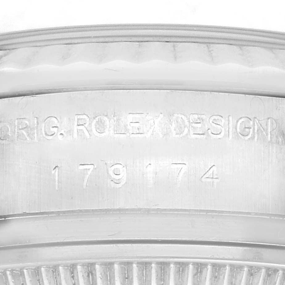 Close-up view of the engraving on the side of the Rolex Datejust M179174 Women's Stainless Steel White Dial M179174 Women's Stainless Steel White Dial watch case, showing model number 179174.
