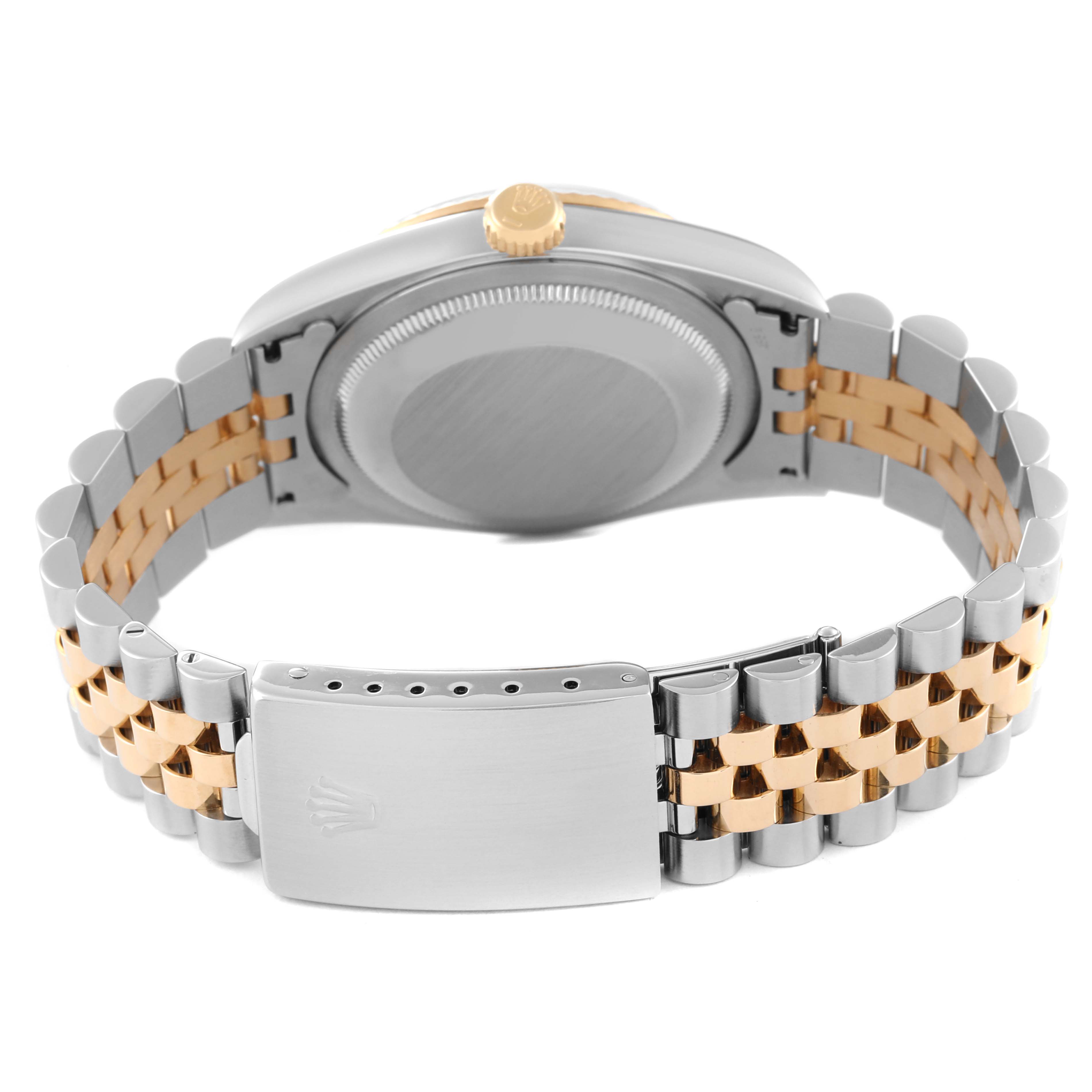 This image shows the back case, crown, and clasp of a Rolex Datejust 16233 Men's Steel and Gold (two tone) Silver Dial 16233 Men's Steel and Gold (two tone) Silver Dial watch at an angled rear view.