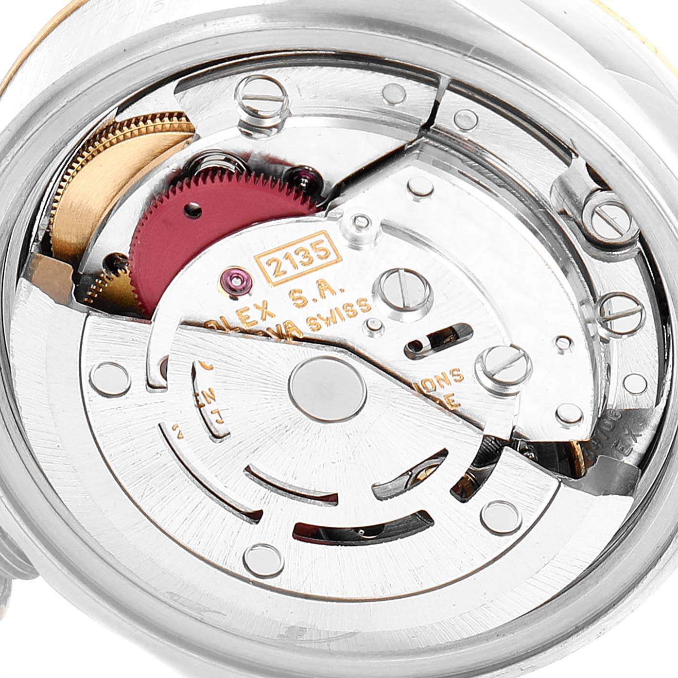 The image shows the internal mechanism of a Rolex Datejust 69173 Women's Steel and Gold (two tone) White Dial 69173 Women's Steel and Gold (two tone) White Dial watch, including gears and the rotor, viewed from the back.