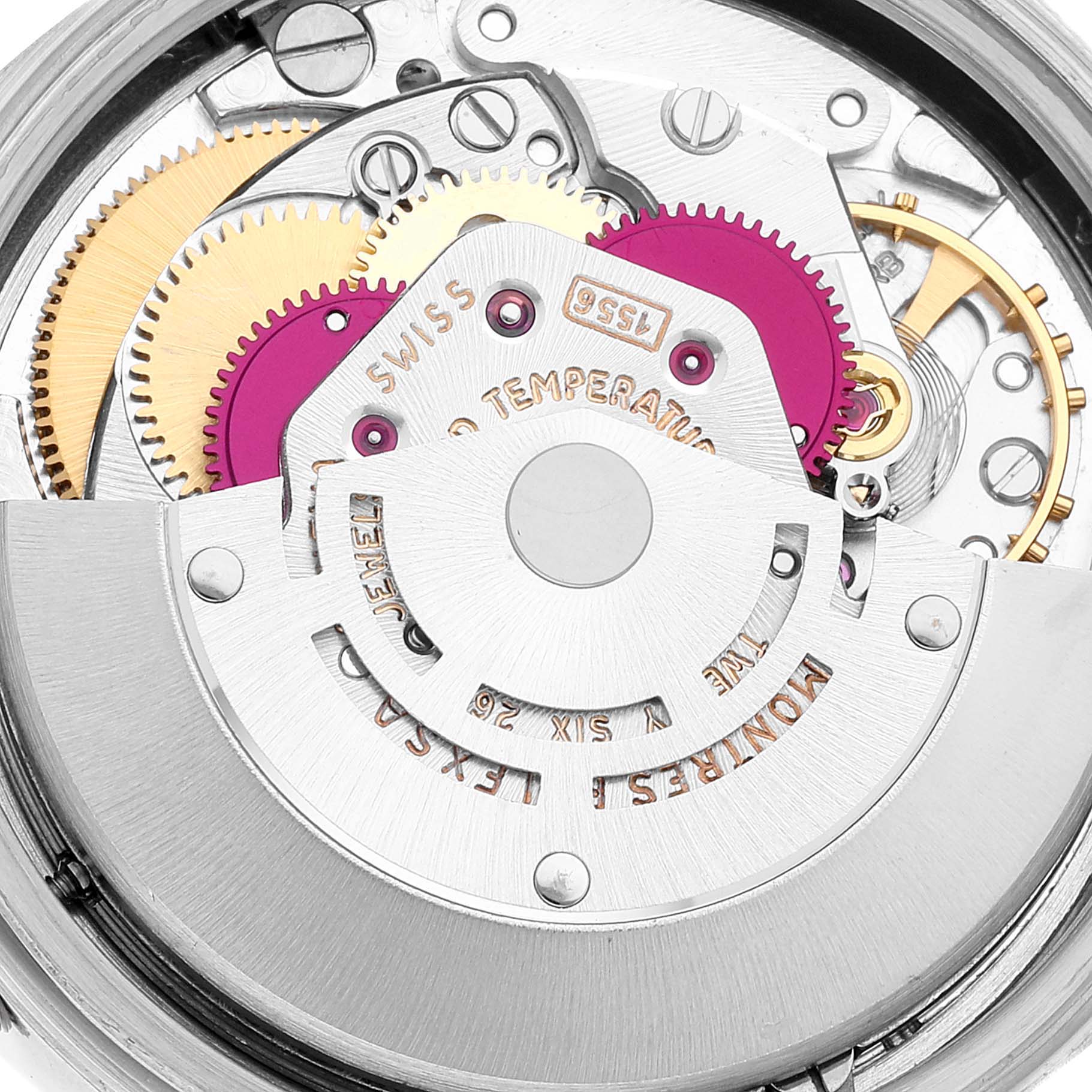 The image shows a close-up view of the internal mechanical movement of a Vintage Collection Rolex watch.