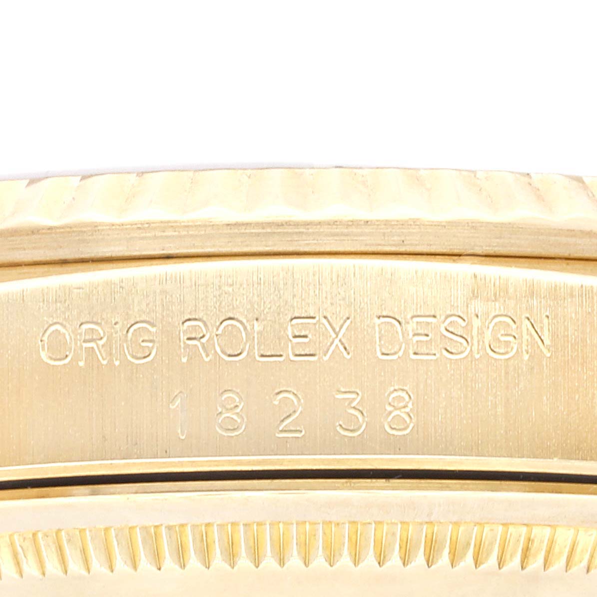 The image shows a close-up of the engraved serial/model number "18238" on the side of the Rolex President 18238 Men's Yellow Gold Champagne Dial 18238 Men's Yellow Gold Champagne Dial watch case.