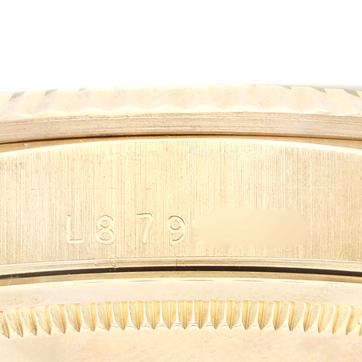 The image shows a close-up view of the engraved model number on the case of a Rolex President 18238 Men's Yellow Gold Champagne Dial 18238 Men's Yellow Gold Champagne Dial watch.