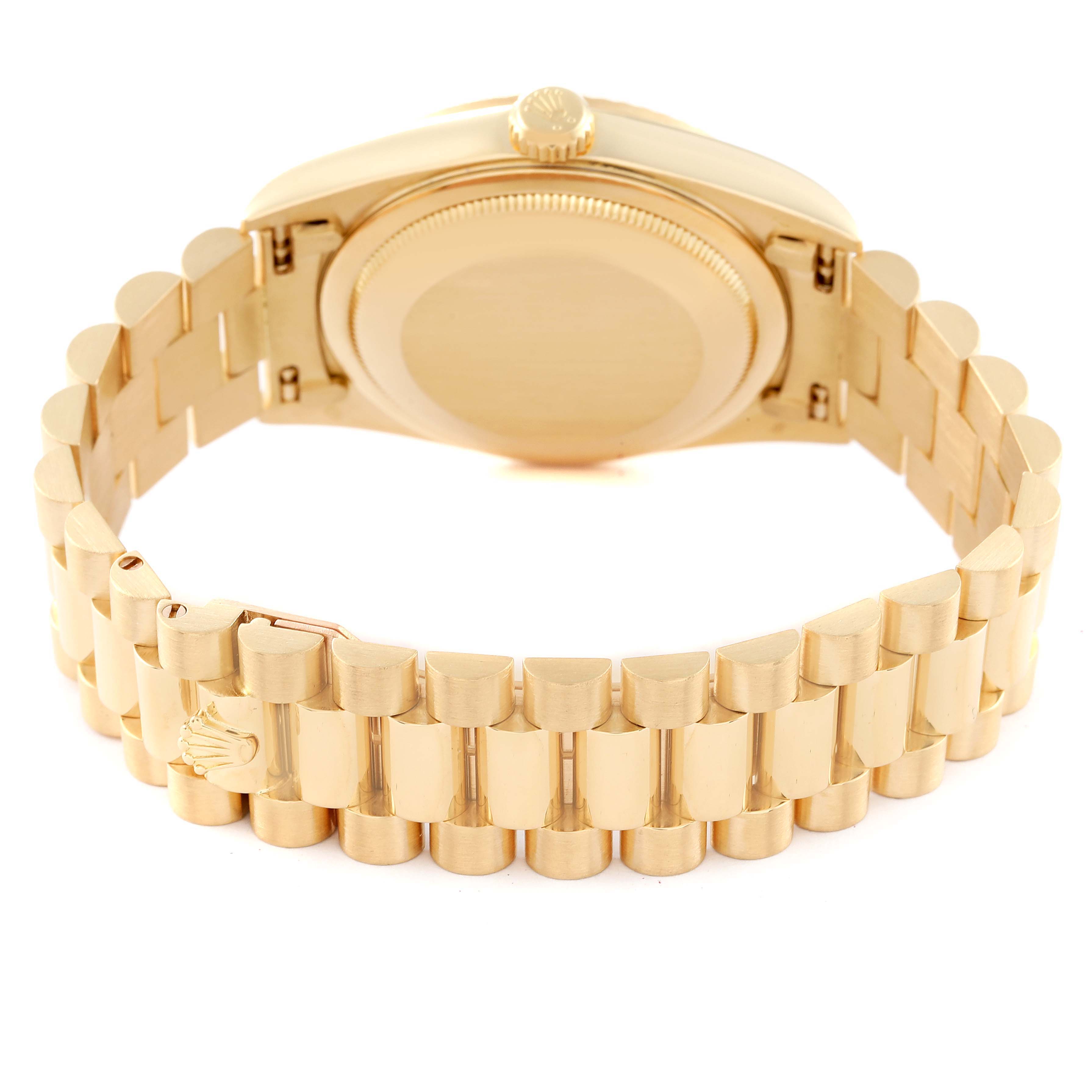 This image shows the back of the Rolex President 18238 Men's Yellow Gold Champagne Dial 18238 Men's Yellow Gold Champagne Dial model watch, highlighting its gold casing and bracelet.