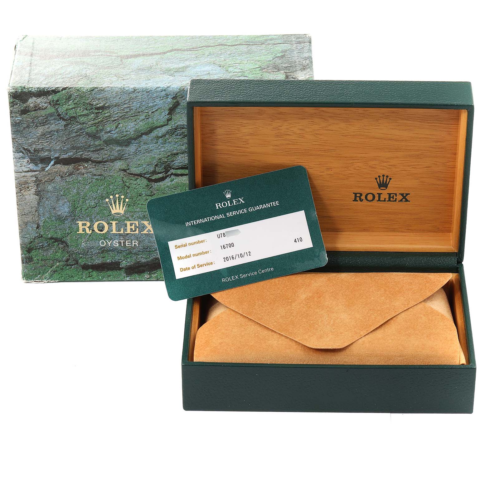 The image shows the packaging and international service guarantee card for a Rolex GMT-Master 16700 Men
s Stainless Steel Black Dial 16700 Men
s Stainless Steel Black Dial.