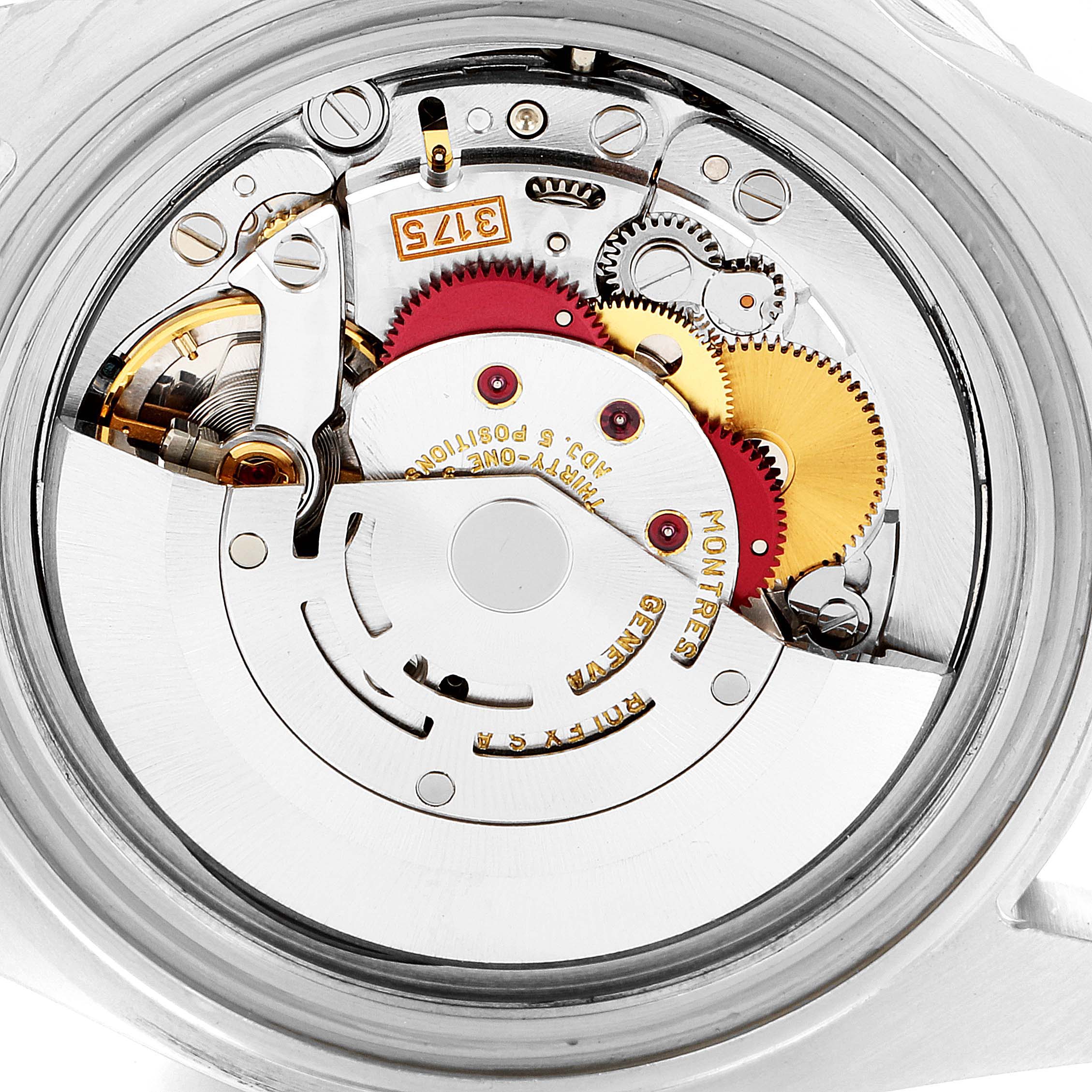 The image shows the internal movement mechanism of a Rolex GMT-Master 16700 Men
s Stainless Steel Black Dial 16700 Men
s Stainless Steel Black Dial watch from a top-down angle.