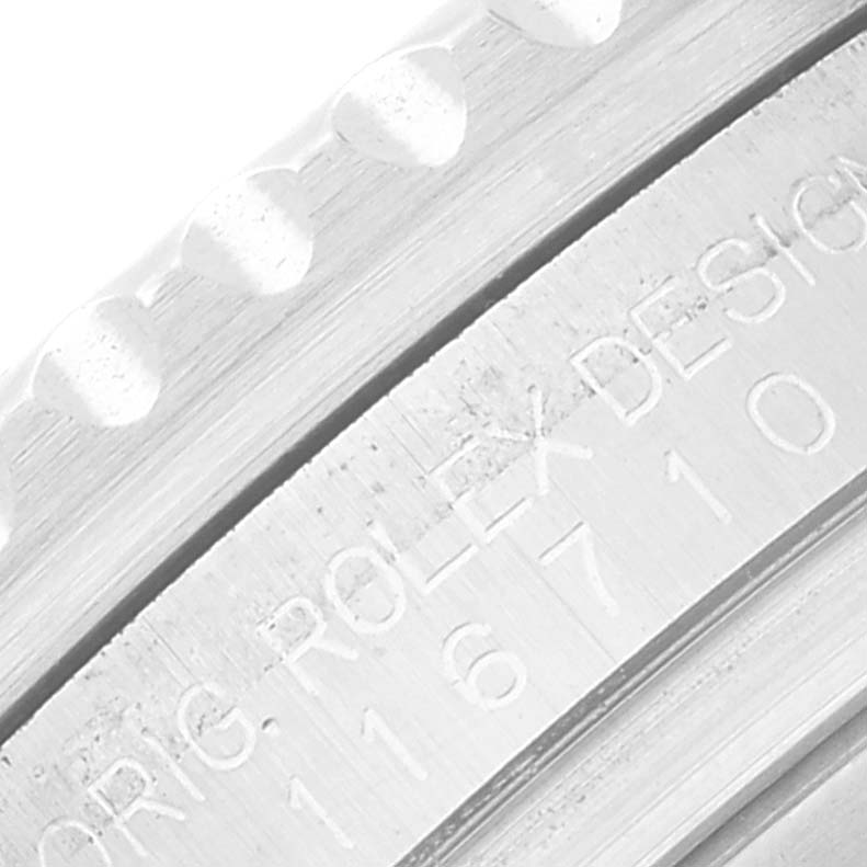 Close-up of the Rolex GMT-Master 116710 Men's Stainless Steel Black Dial 116710 Men's Stainless Steel Black Dial bezel and case, showing the engraved model number "116710."