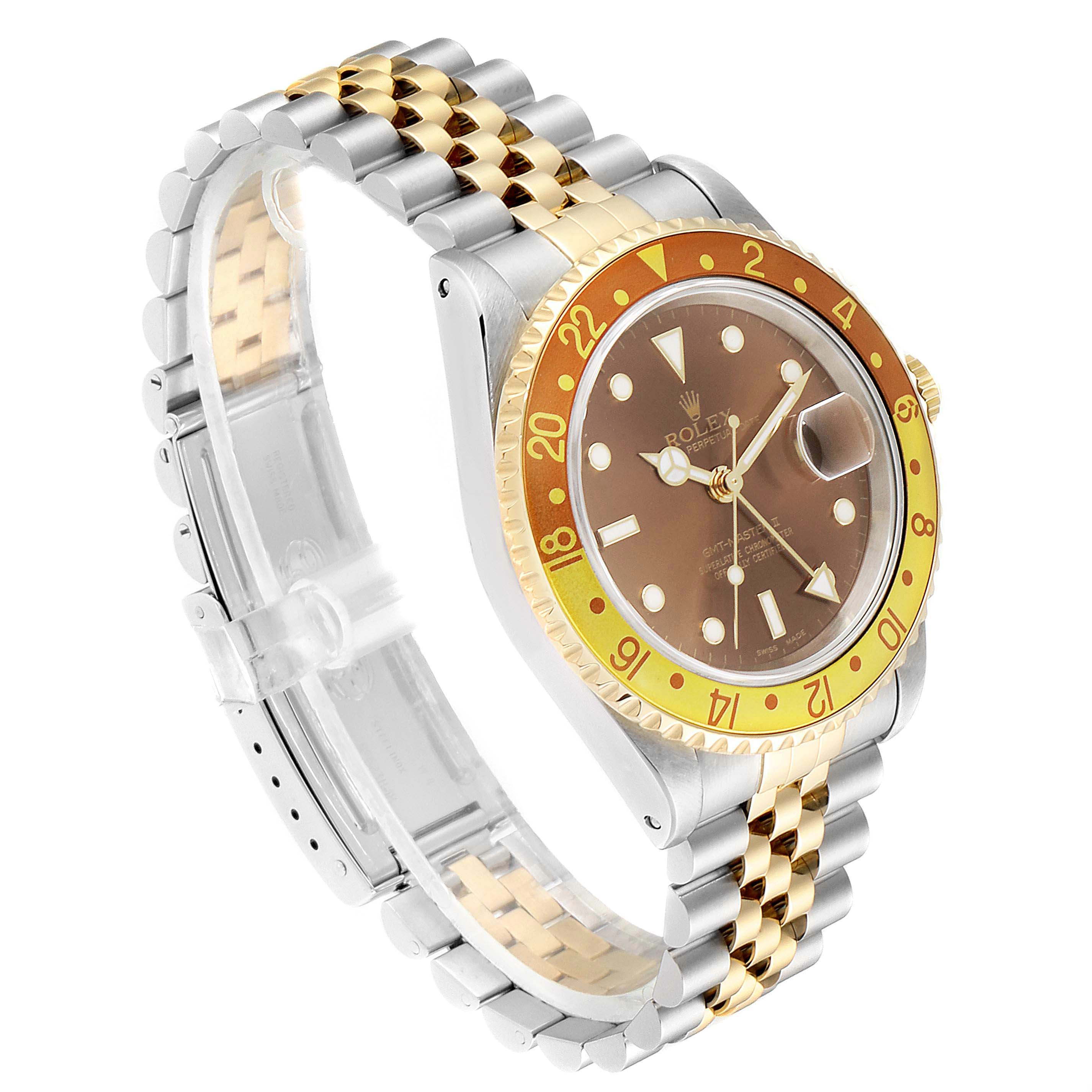 The image shows a Rolex GMT-Master 16713 Men's Steel and Gold (two tone) Brown Dial 16713 Men's Steel and Gold (two tone) Brown Dial watch from an angled side view, highlighting its bezel, dial, and two-tone bracelet.