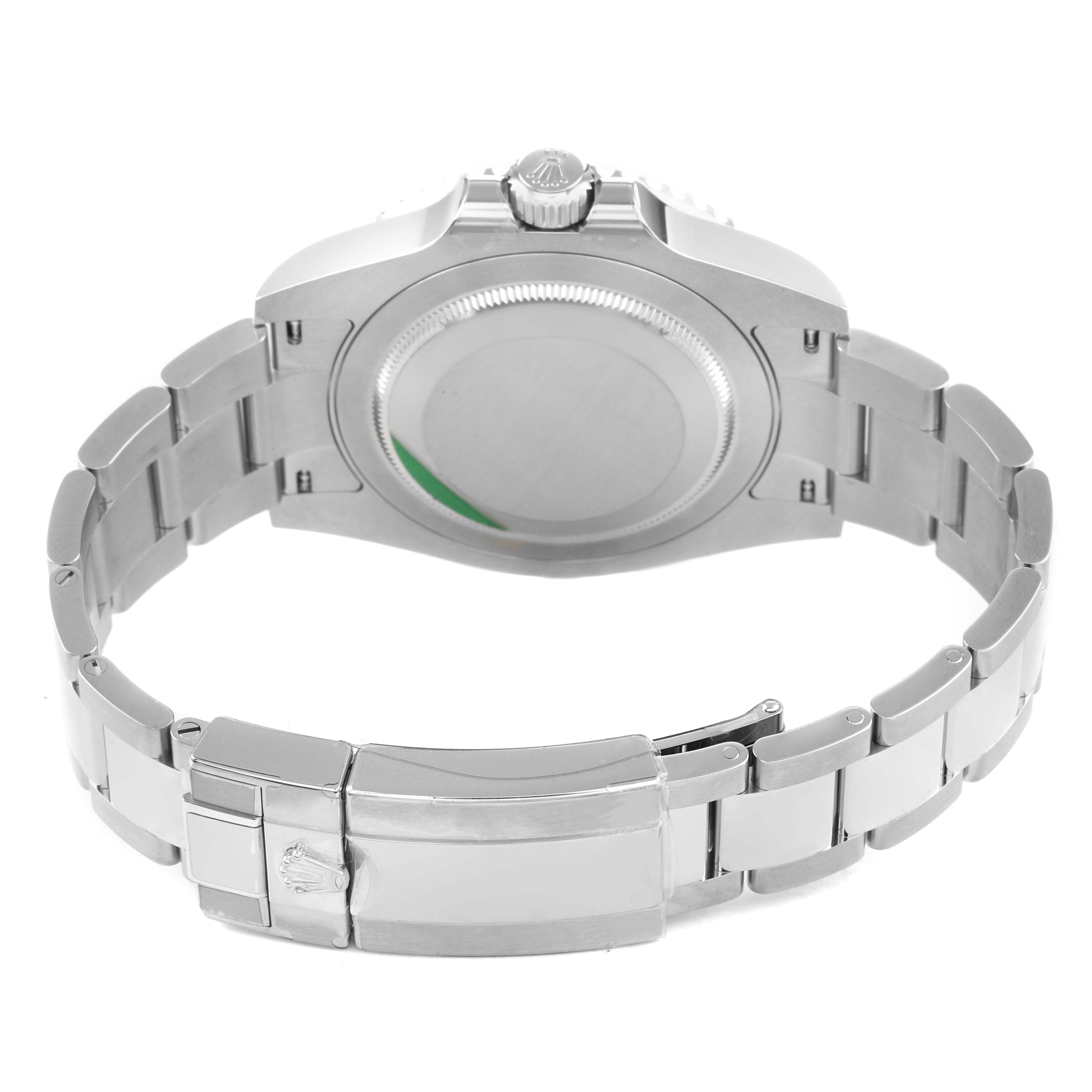 The image shows the back view of a Rolex GMT-Master 126710GRNR Men's Stainless Steel Black Dial watch, highlighting the case back, bracelet, and clasp.