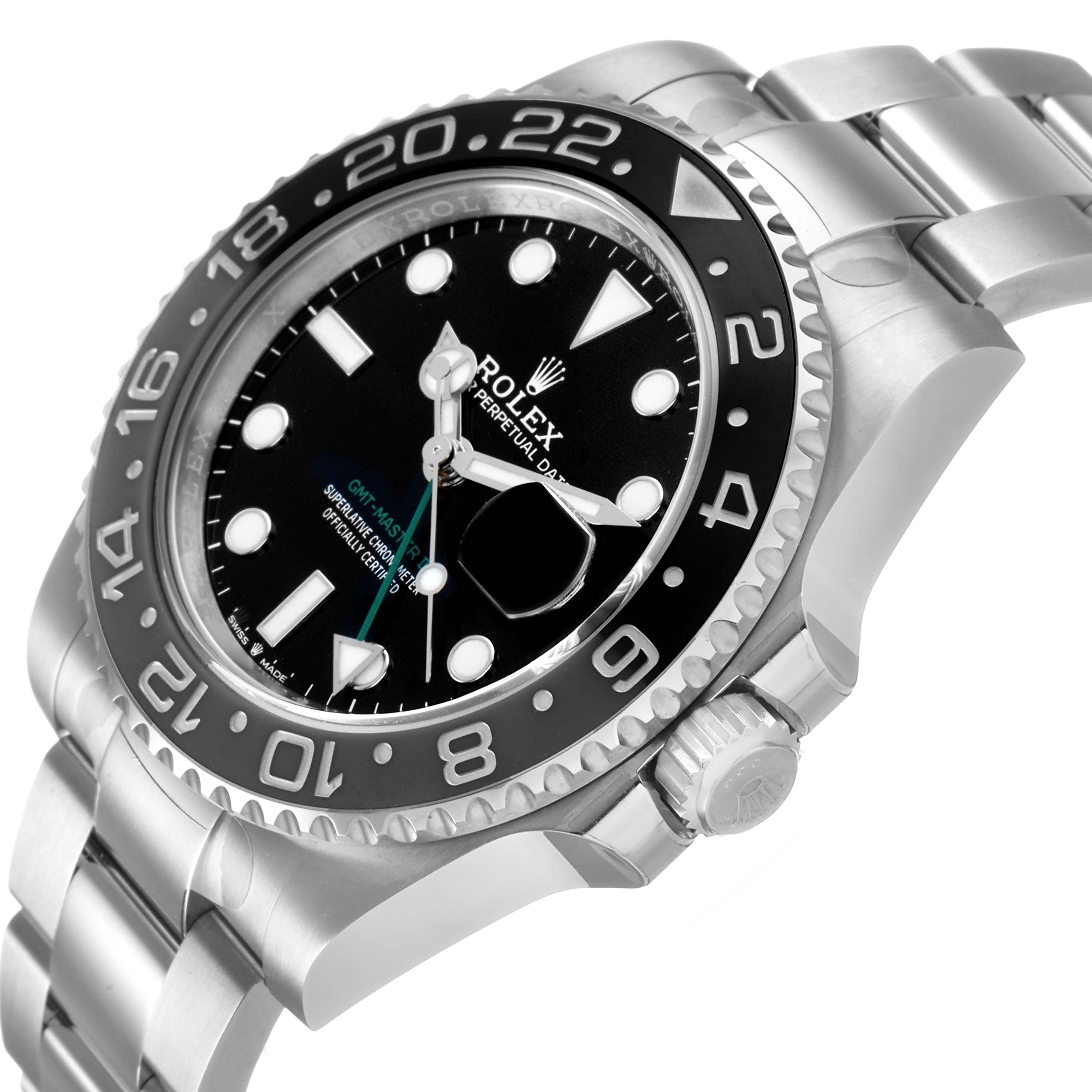 The Rolex GMT-Master 126710GRNR Men's Stainless Steel Black Dial watch is shown at a slight side angle, highlighting the bezel, crown, bracelet, and dial.