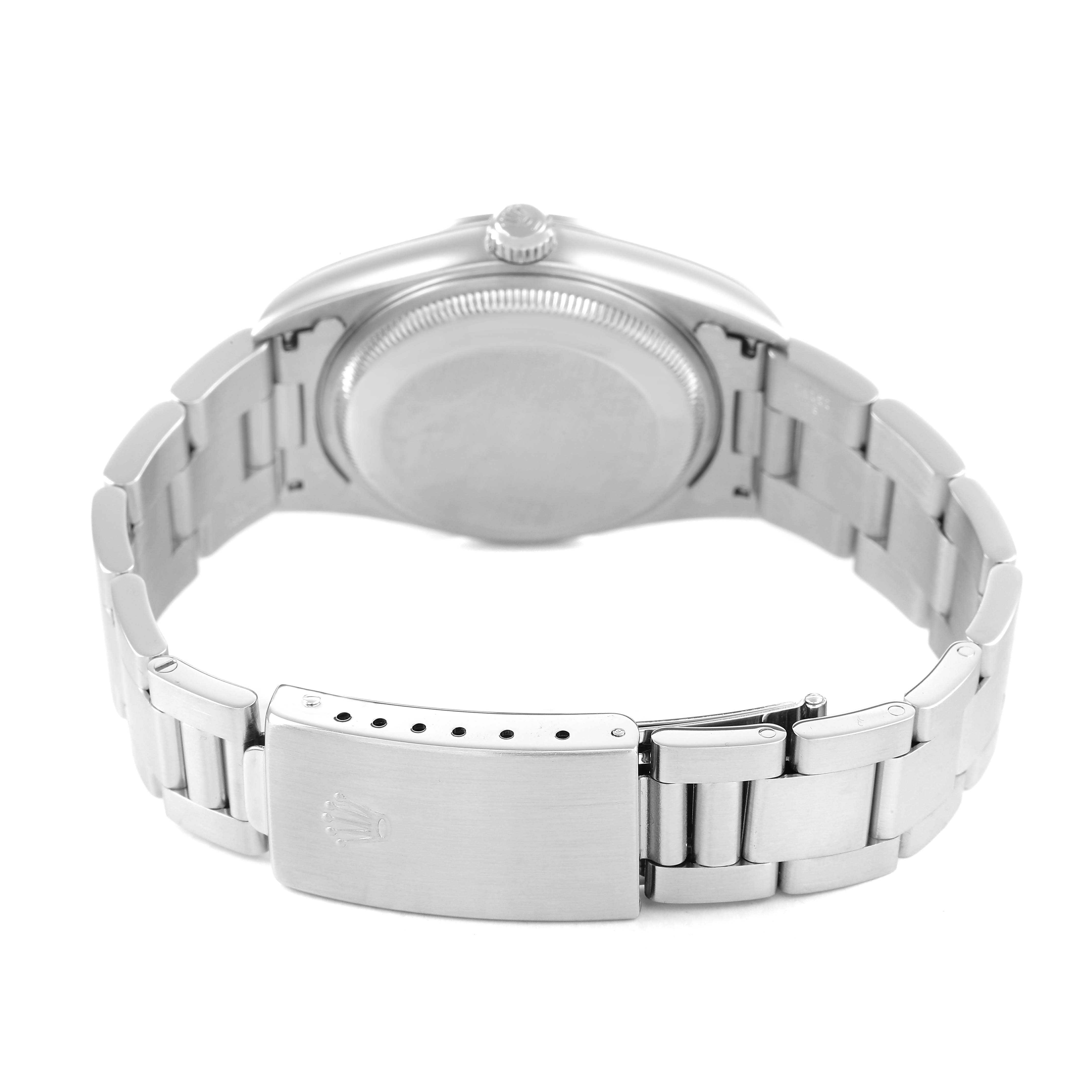 The image shows the back of the Rolex Date 15200 Men's Stainless Steel Black Dial model watch, focusing on the case back and clasp.